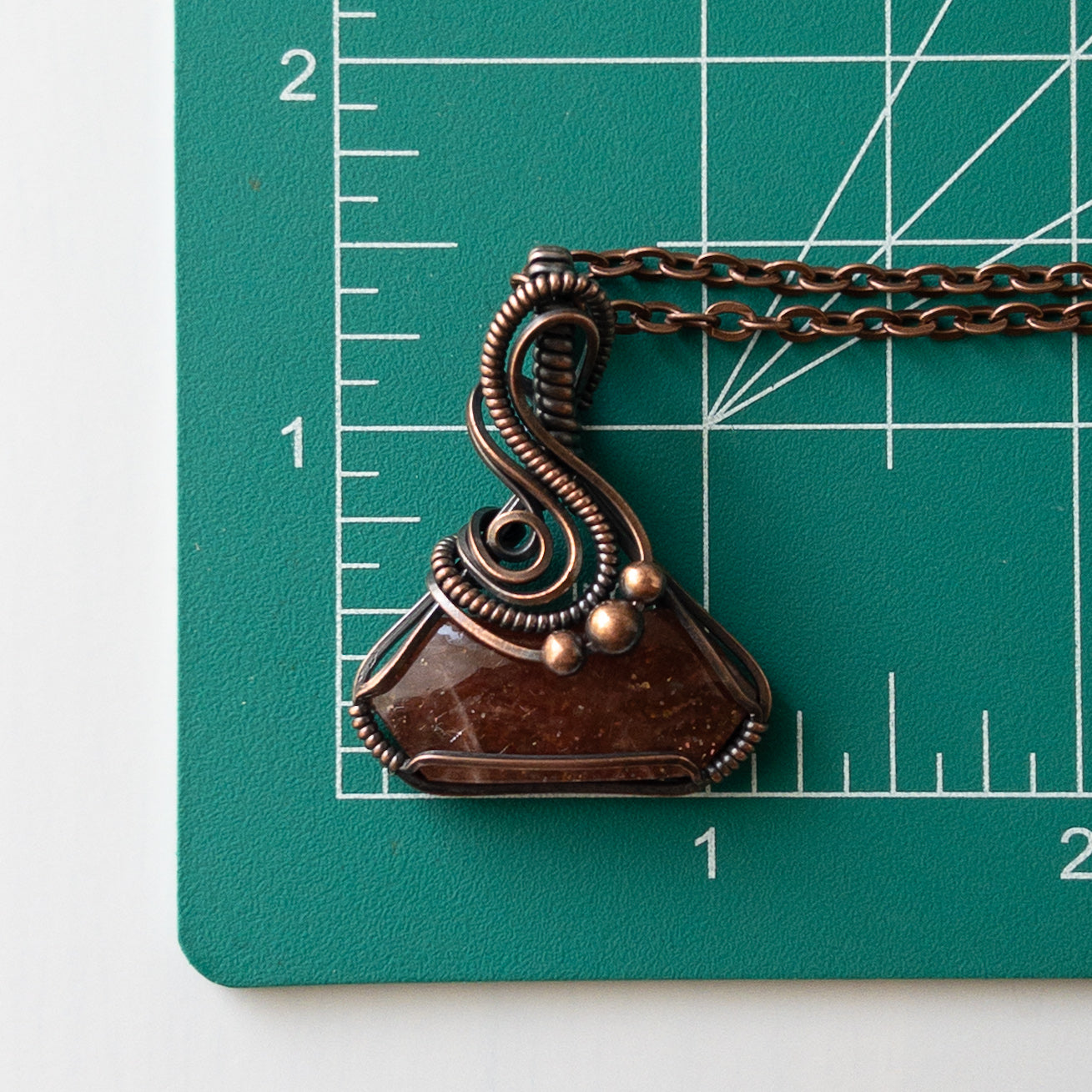 Sunstone “Potion Bottle” Shaped Copper Wrapped Pendant