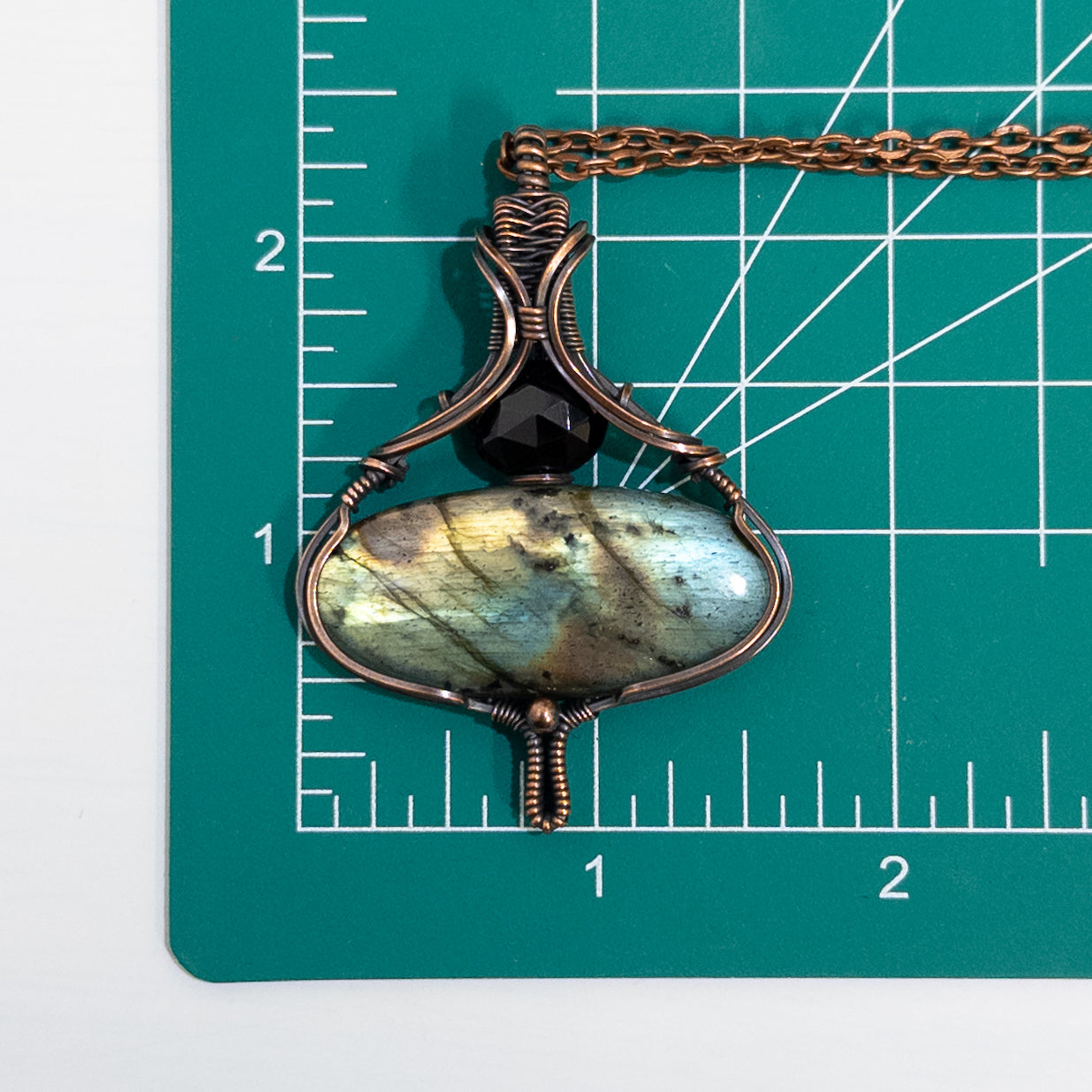 Metamorphosis - Labradorite & Faceted Black Spinel Copper Pendant