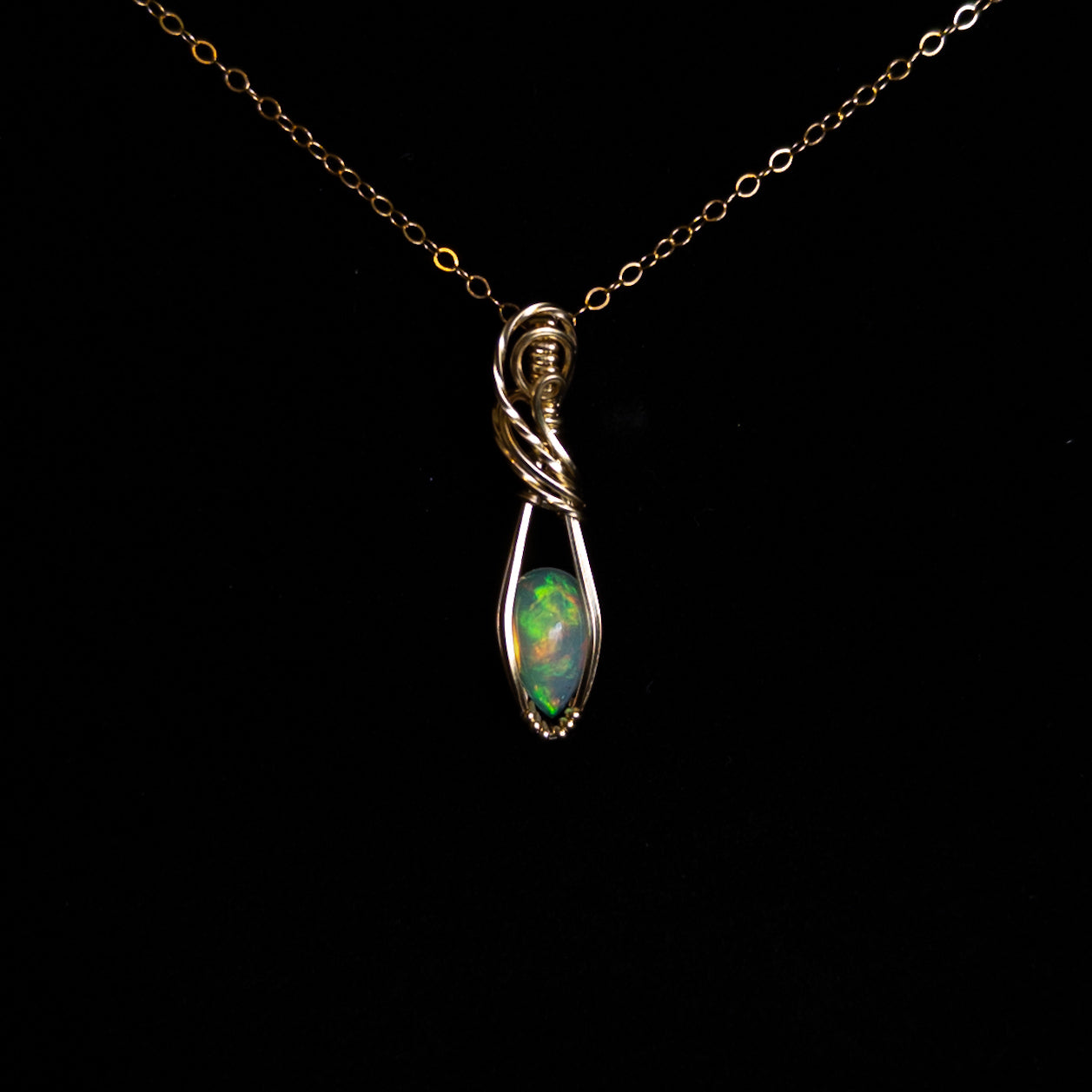1 Carat Ethiopian Opal 14k Gold Filled Wrapped Pendant