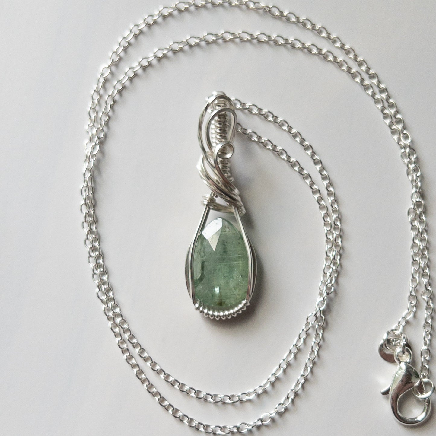 Faceted Green Kyanite & Sterling Silver Wrapped Pendant