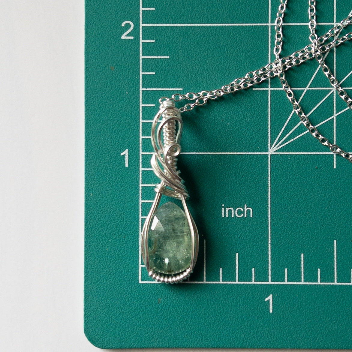 Faceted Green Kyanite & Sterling Silver Wrapped Pendant