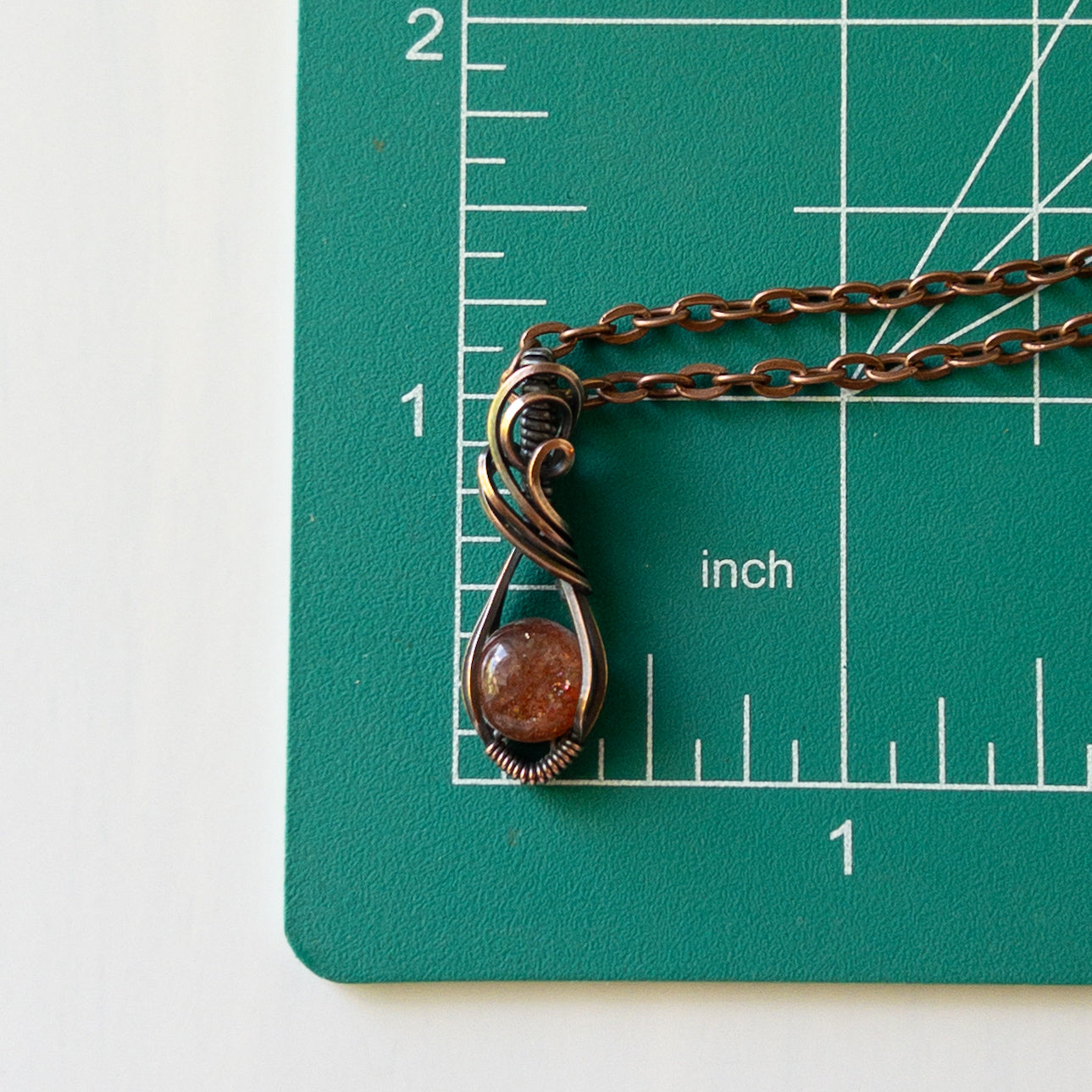 Mini Sunstone & Antiqued Copper Wrapped Pendant
