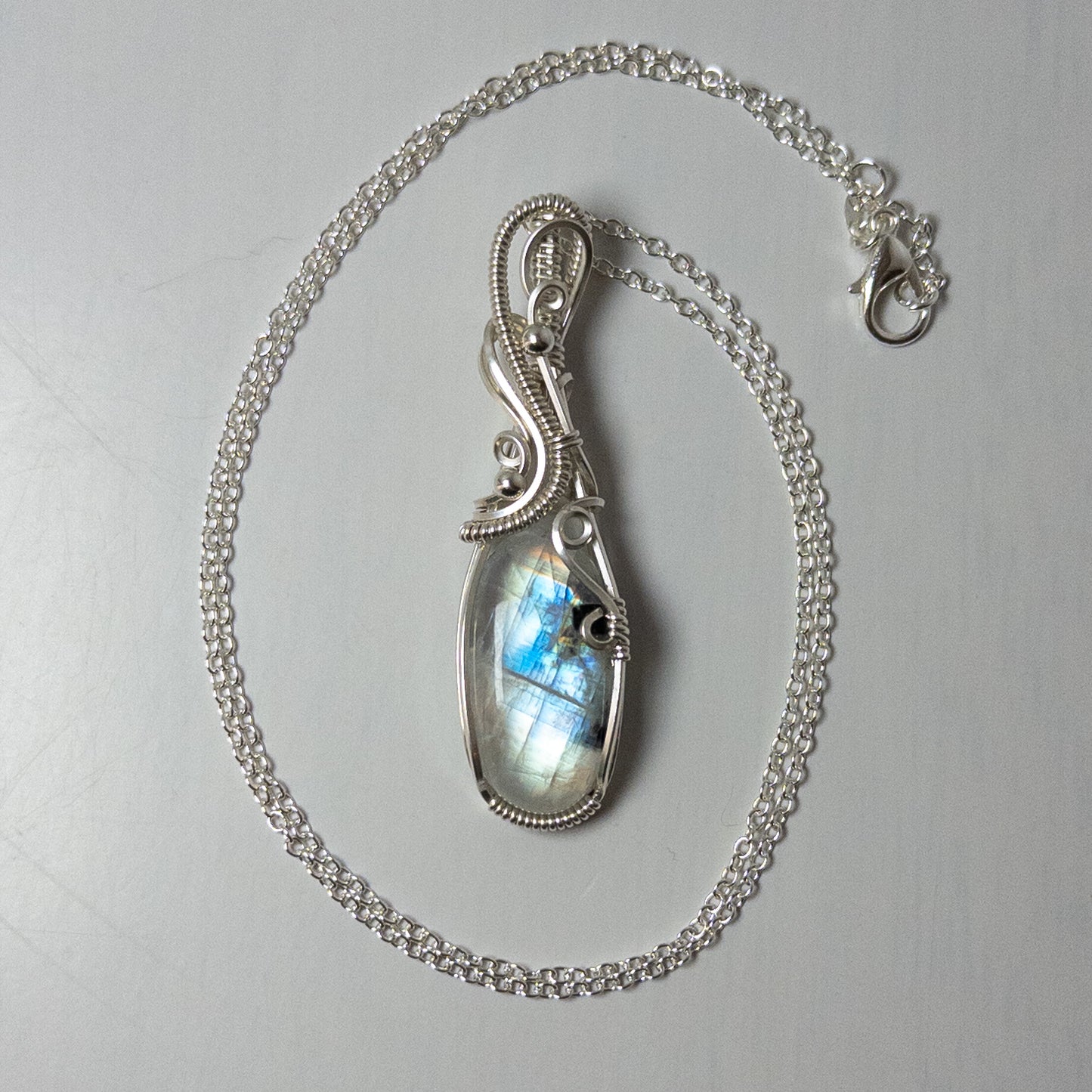Rainbow Moonstone Sterling Silver Wrapped Pendant