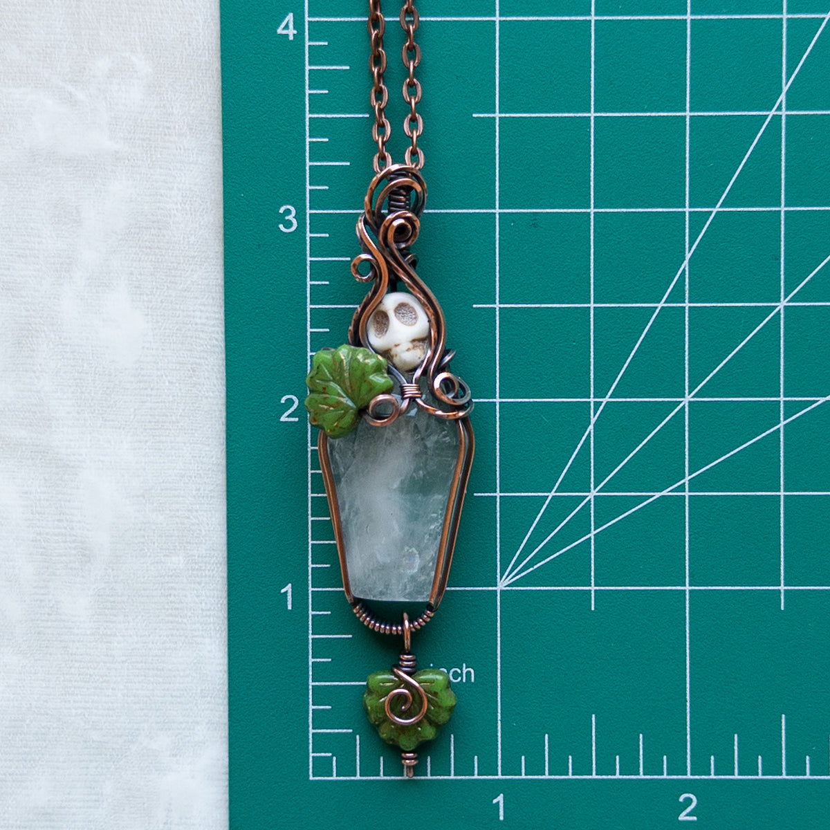 Quartz Coffin & Skull Antiqued Copper Pendant With Czech Glass Leaves