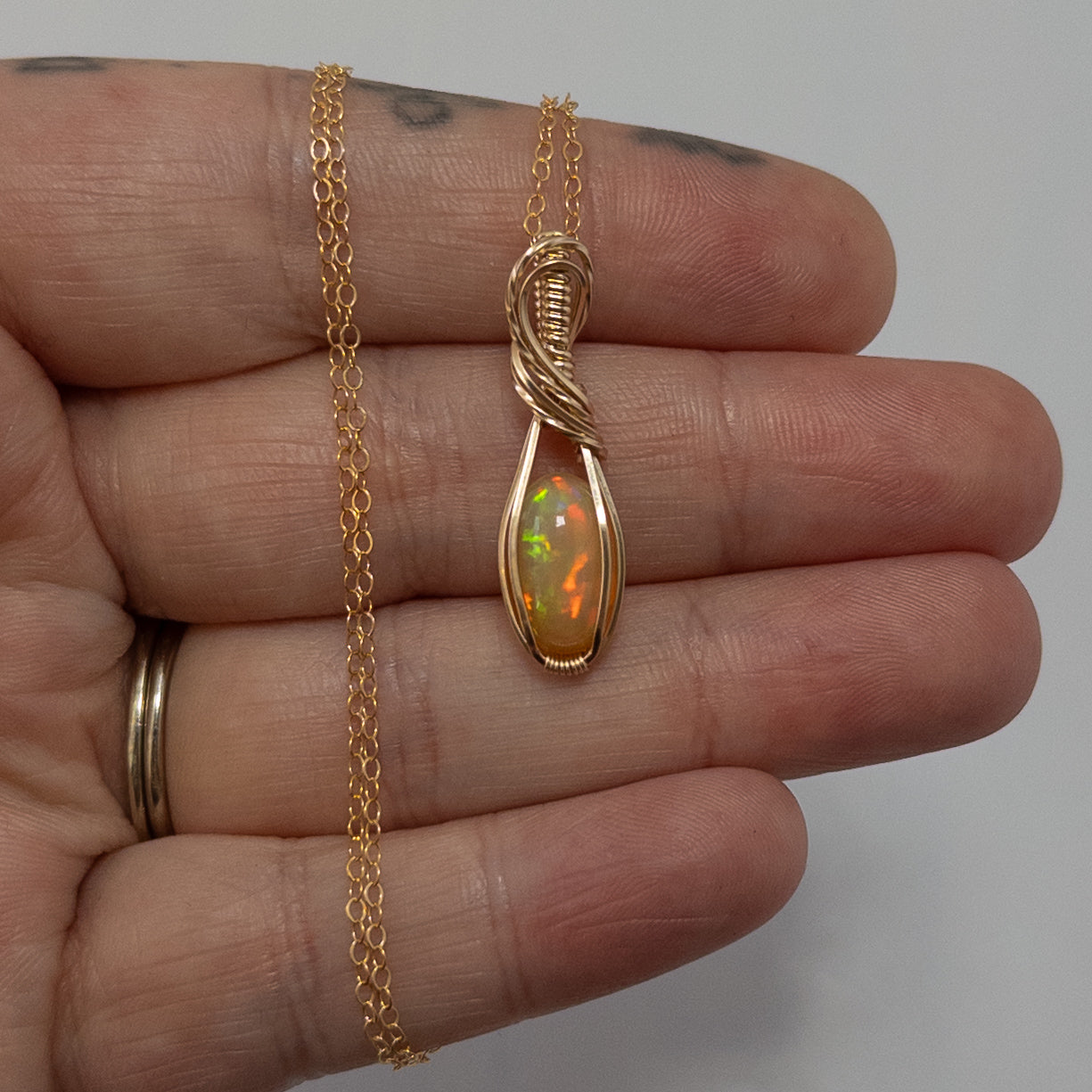 2.25 Carat Peachy Ethiopian Opal 14k Gold Filled Wrapped Pendant