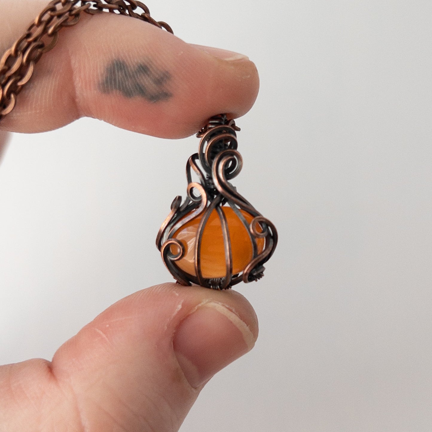 Dainty Carnelian Pumpkin Antiqued Copper Wrapped Pendant