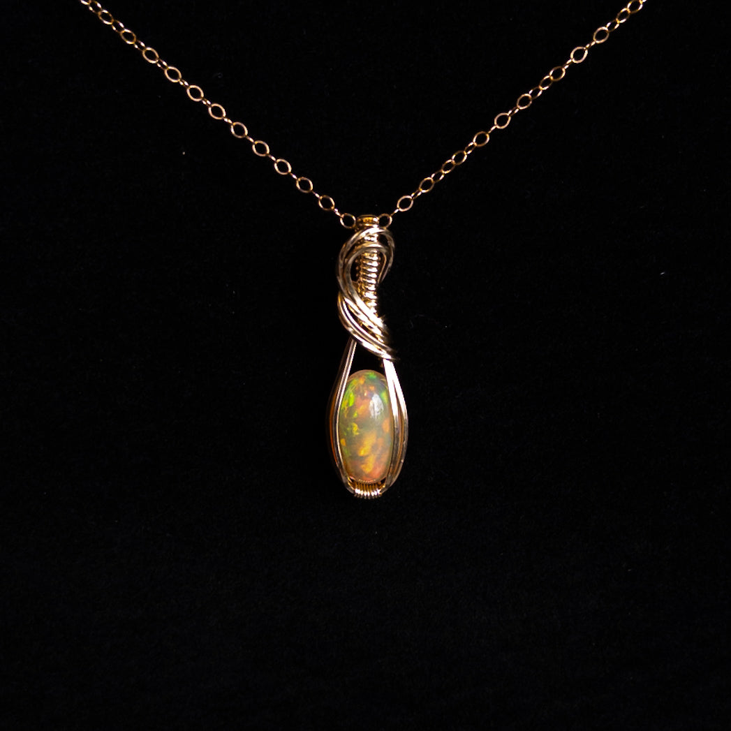 2.25 Carat Peachy Ethiopian Opal 14k Gold Filled Wrapped Pendant