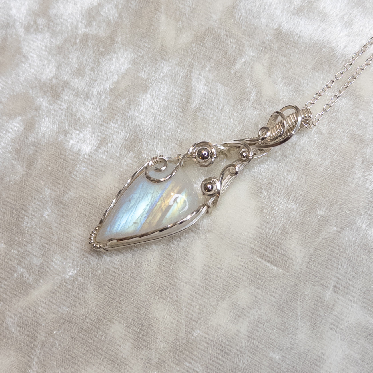 “Bubbles” Rainbow Moonstone & Sterling Silver Wrapped Pendant