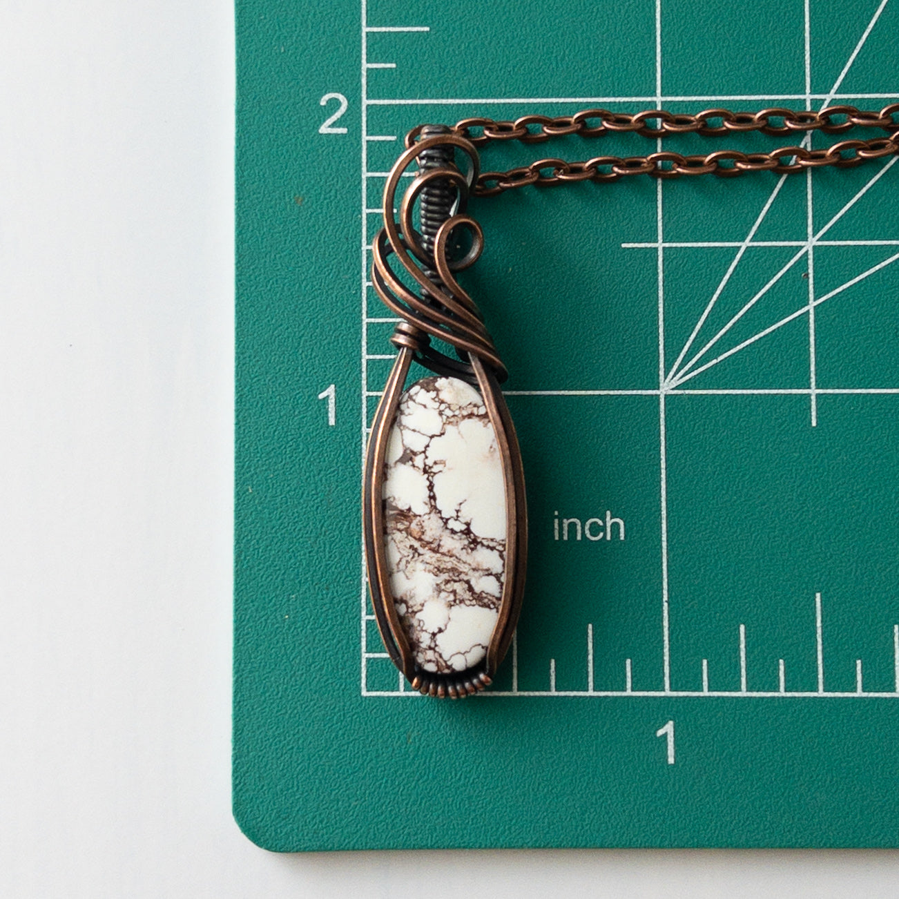 Wild Horse Magnesite Copper Wrapped Pendant