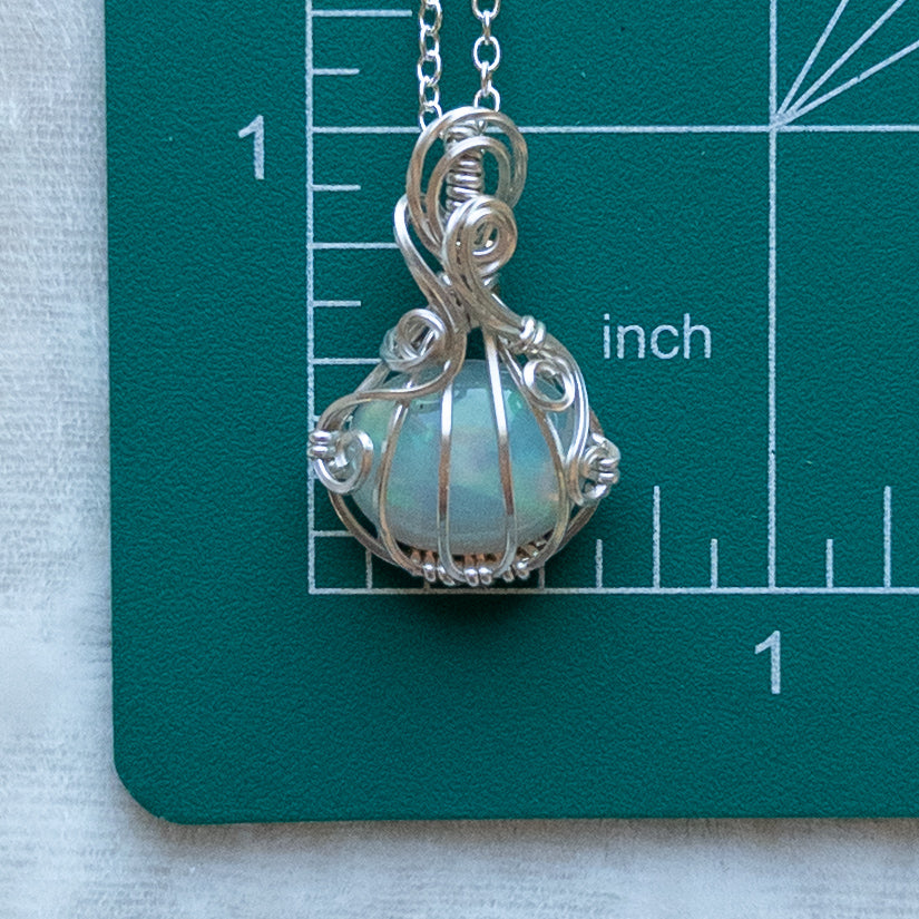 3.6 Carat Ethiopian Opal Sterling Silver Pumpkin Pendant