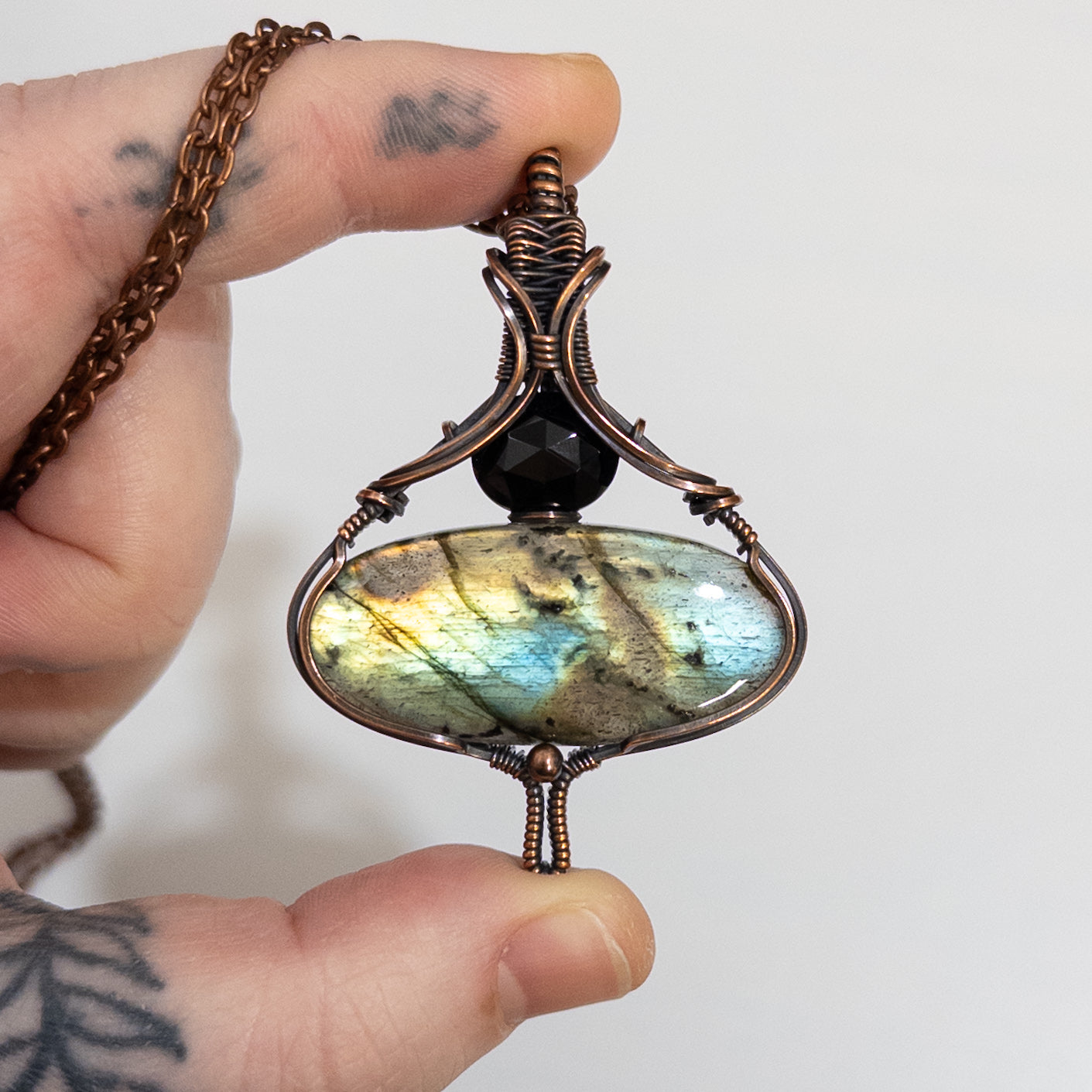 Metamorphosis - Labradorite & Faceted Black Spinel Copper Pendant