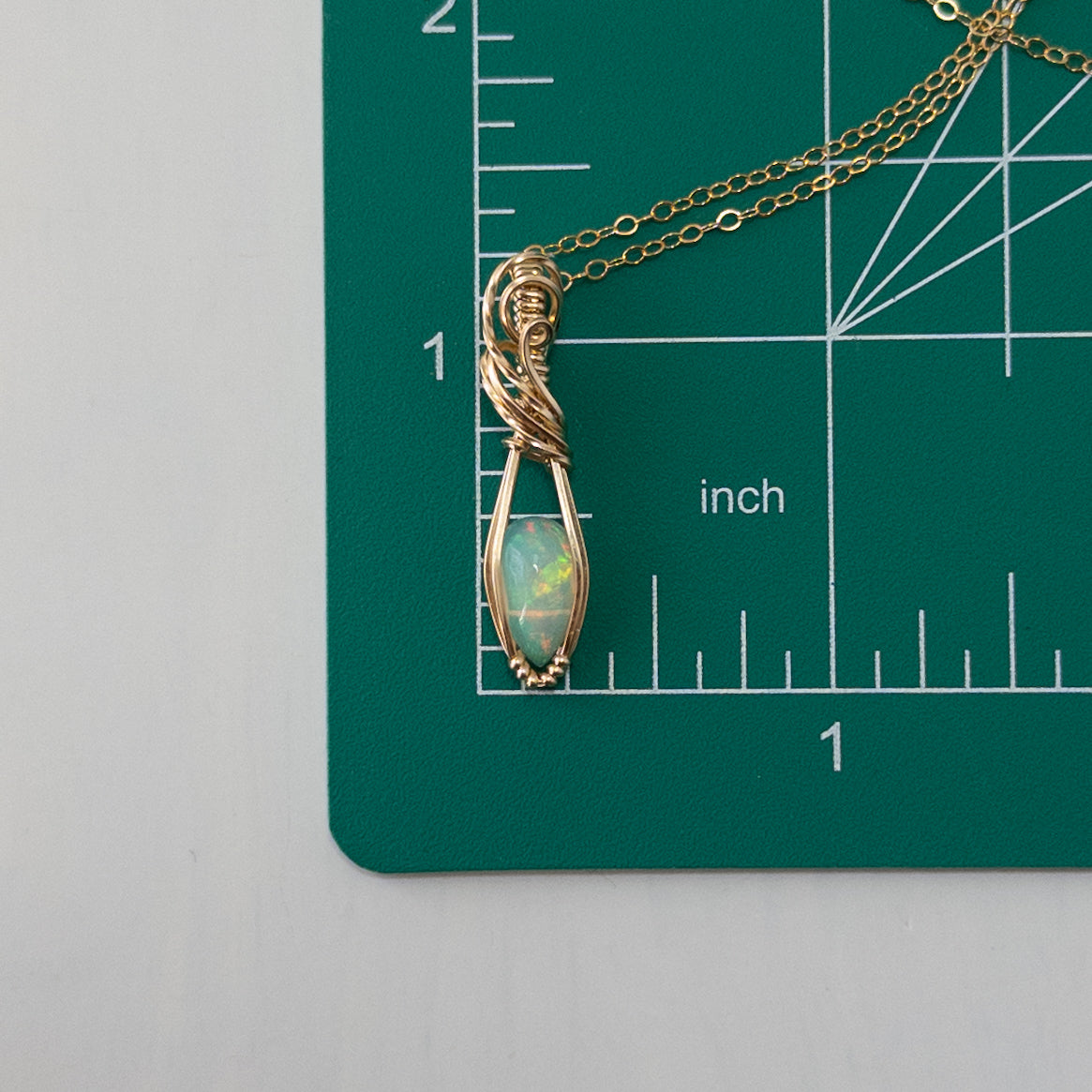 1 Carat Ethiopian Opal 14k Gold Filled Wrapped Pendant