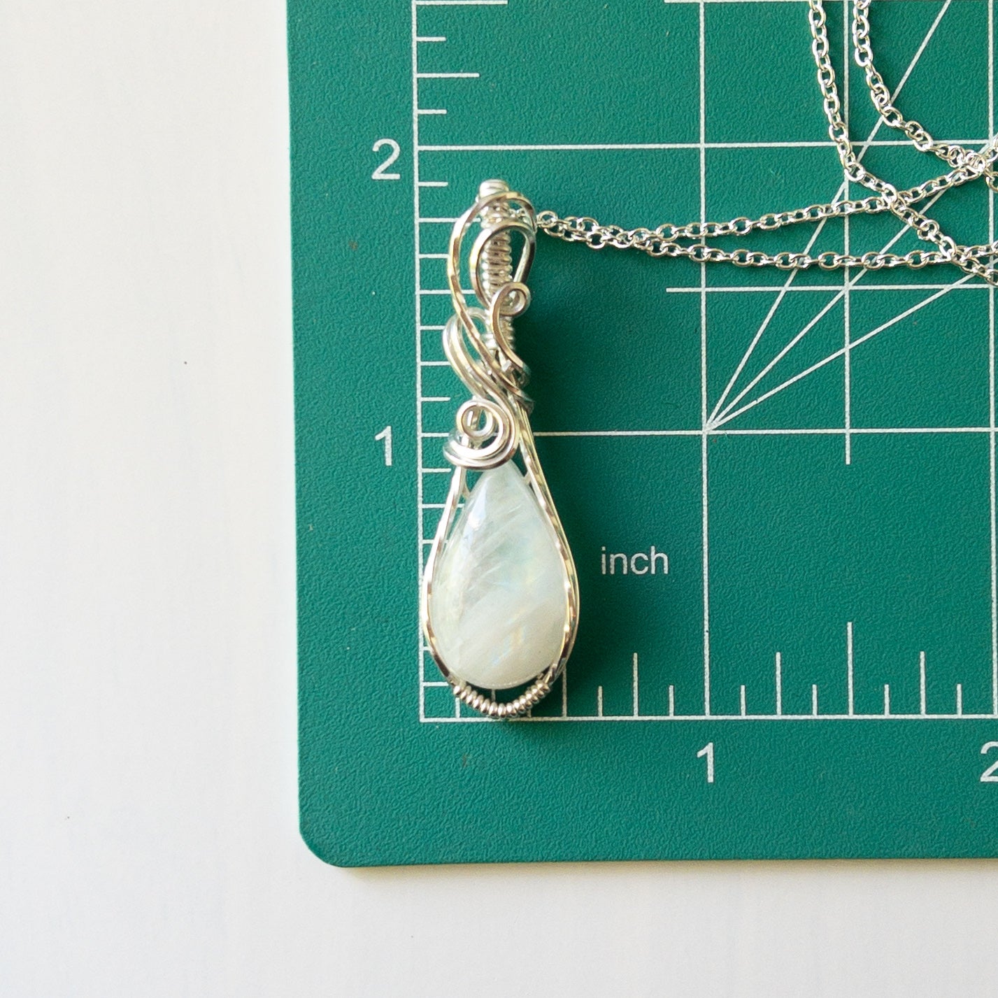 Rainbow Moonstone & Sterling Silver Wrapped Pendant