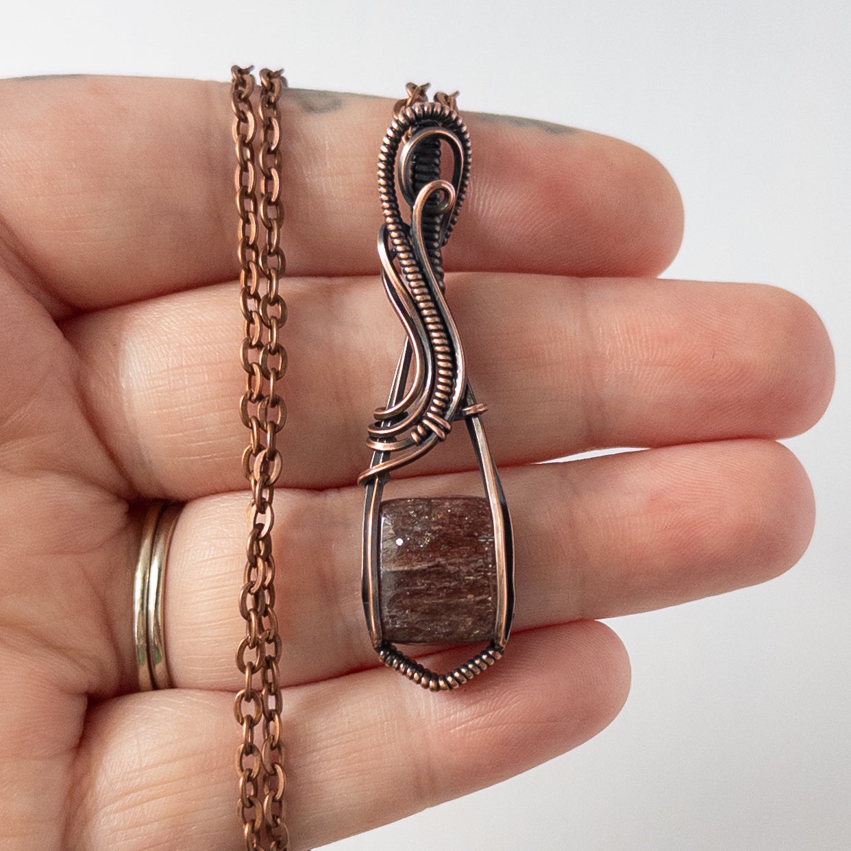 Bloodshot Iolite Sunstone Antiqued Copper Wrapped Pendant