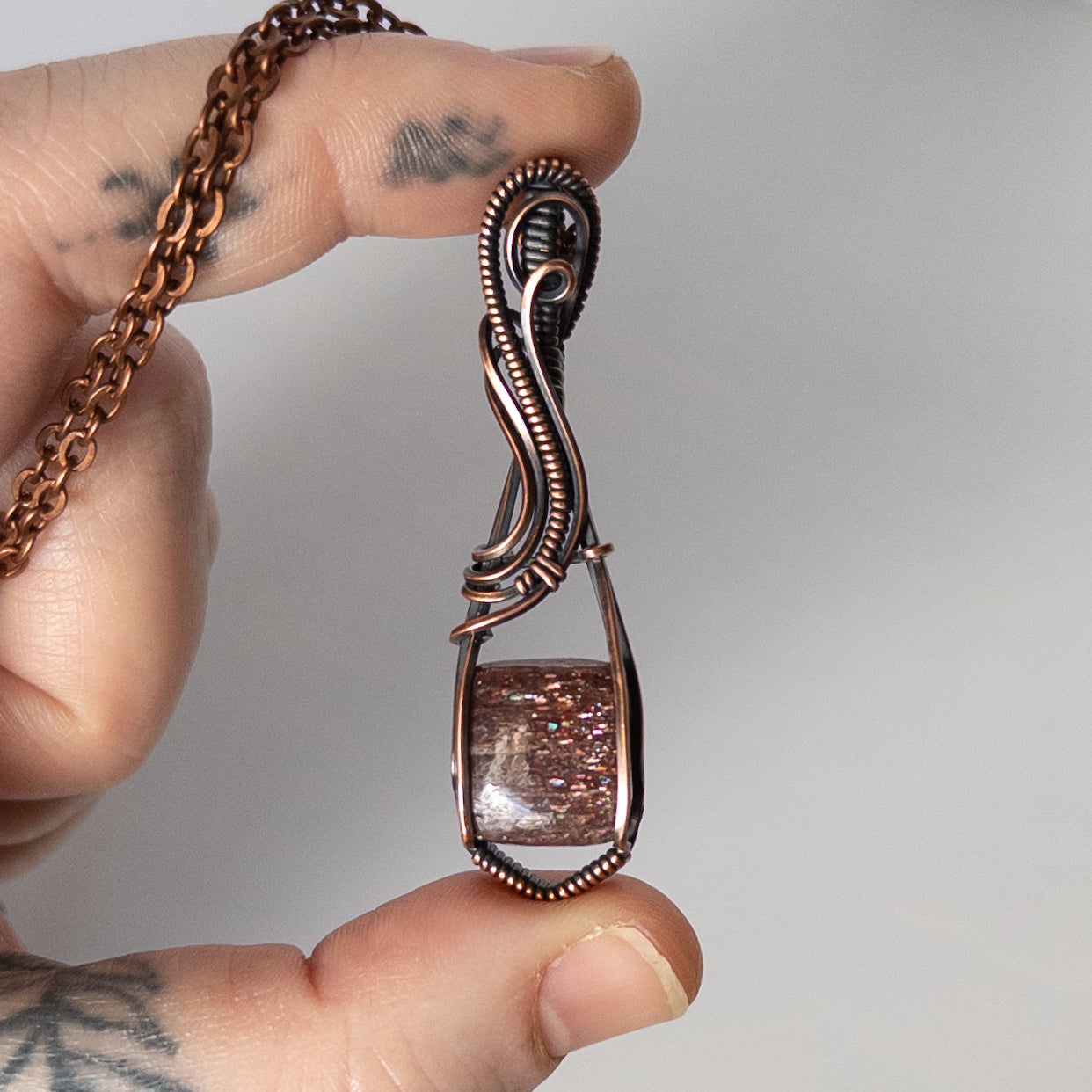 Bloodshot Iolite Sunstone Antiqued Copper Wrapped Pendant