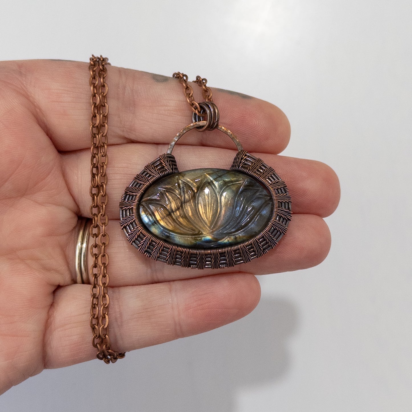 Lotus Carved Labradorite Woven Copper Pendant