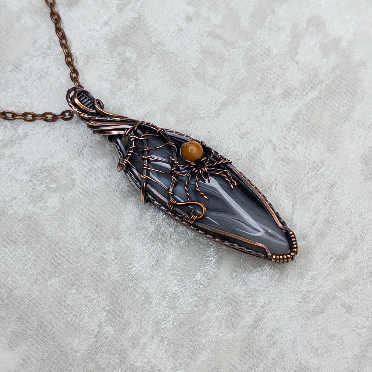 Botswana Agate Spider Web Antiqued Copper Pendant With Orange Aventurine Spider