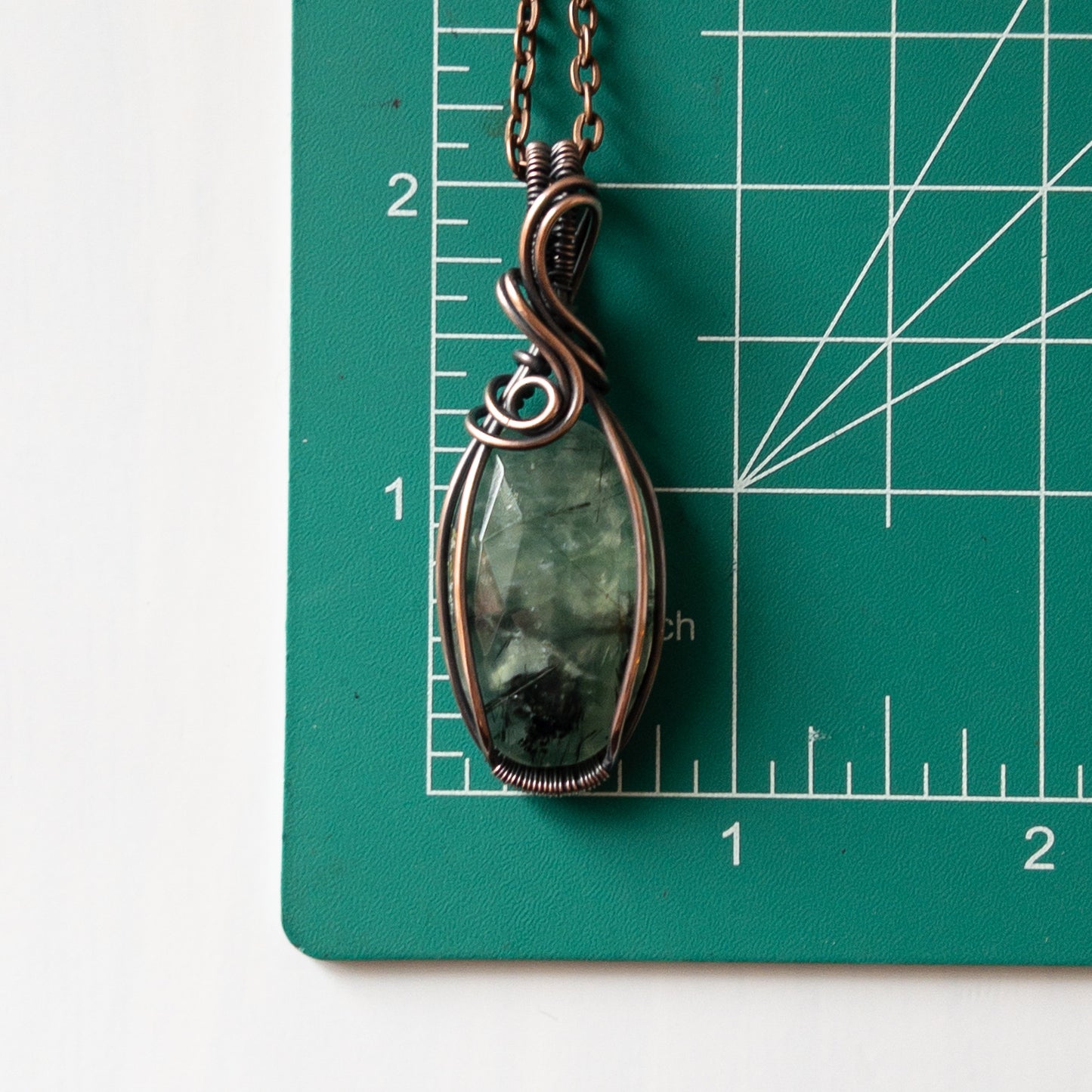 Faceted Prehnite & Copper Wrapped Pendant