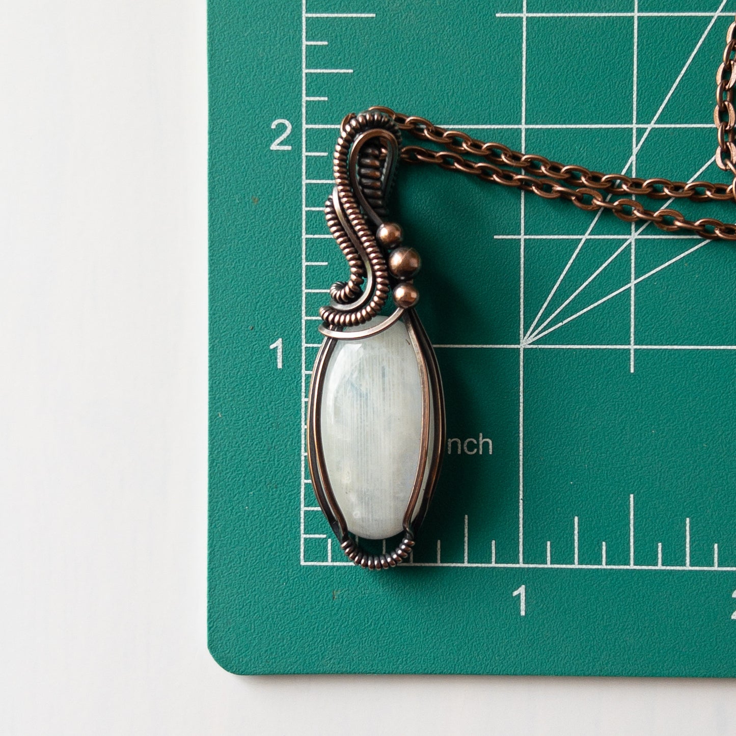 Blue Flash Moonstone & Copper Wrapped Pendant