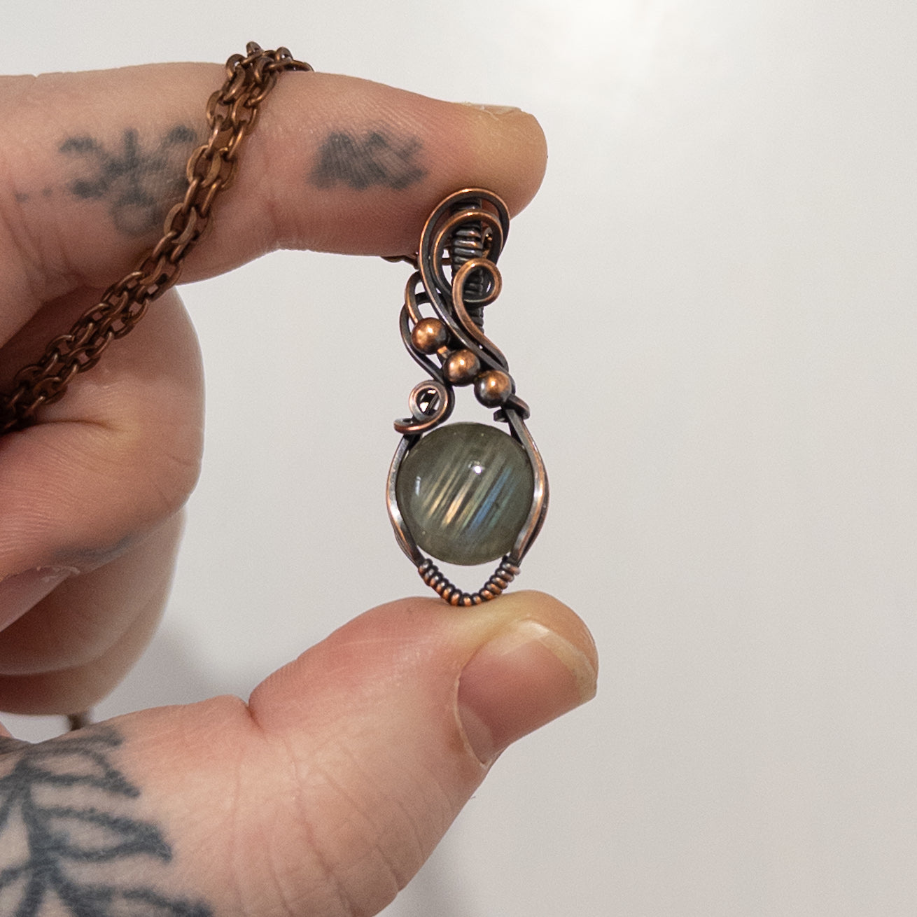 Diagonalis- Labradorite Wrapped Copper Pendant