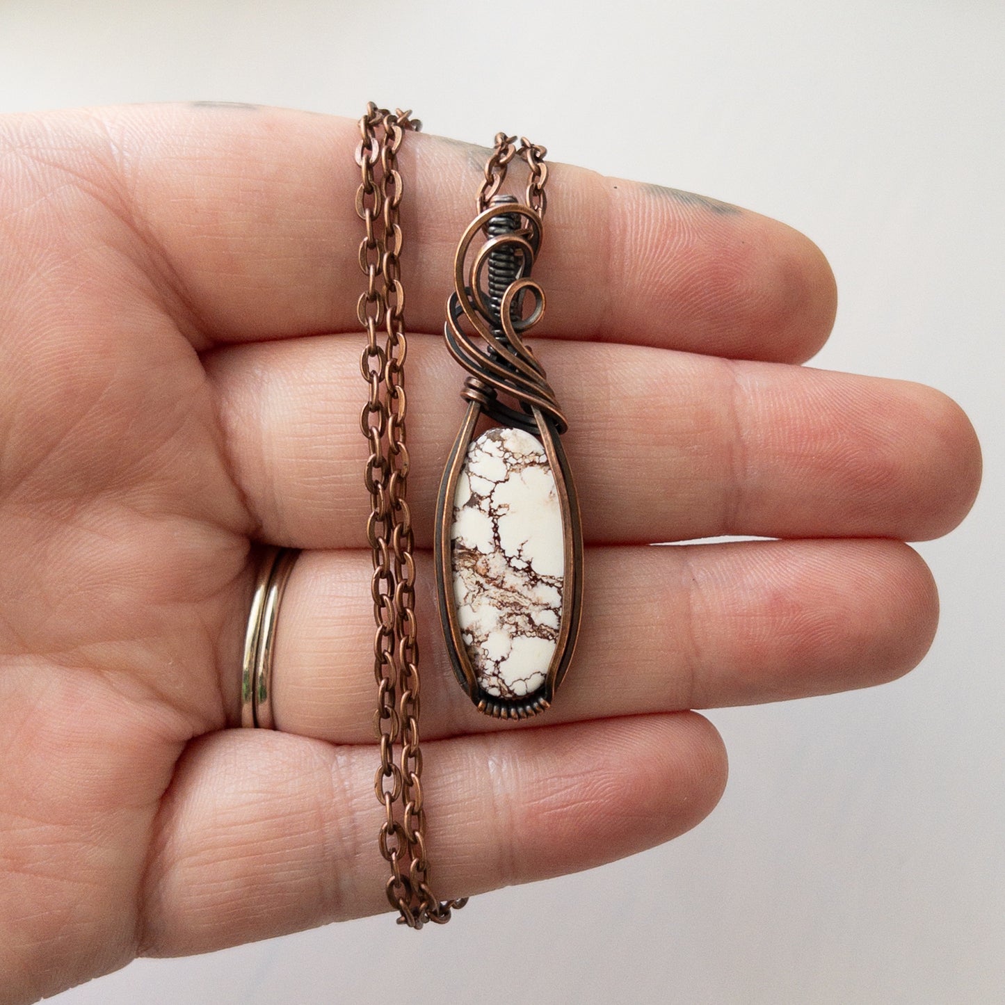 Wild Horse Magnesite Copper Wrapped Pendant