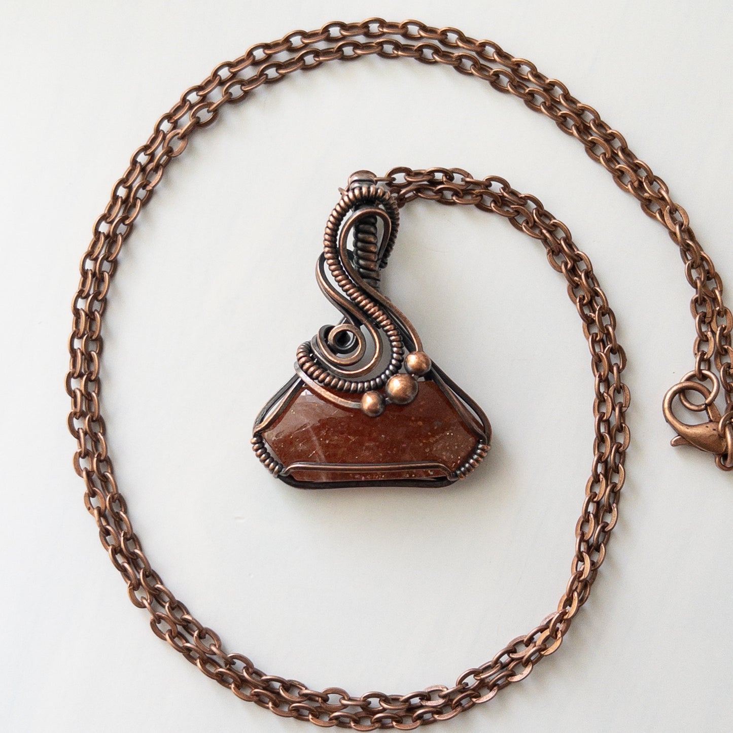 Sunstone “Potion Bottle” Shaped Copper Wrapped Pendant
