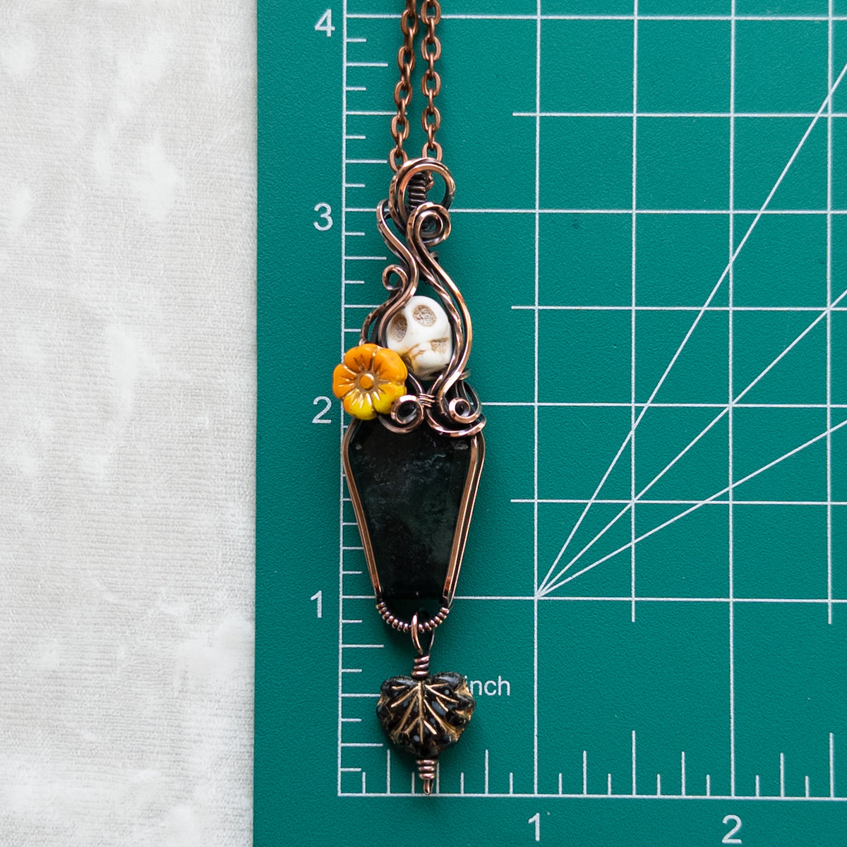 Moss Agate Coffin, Skull, & Marigold Antiqued Copper Pendant With Dangling Czech Glass Leaf