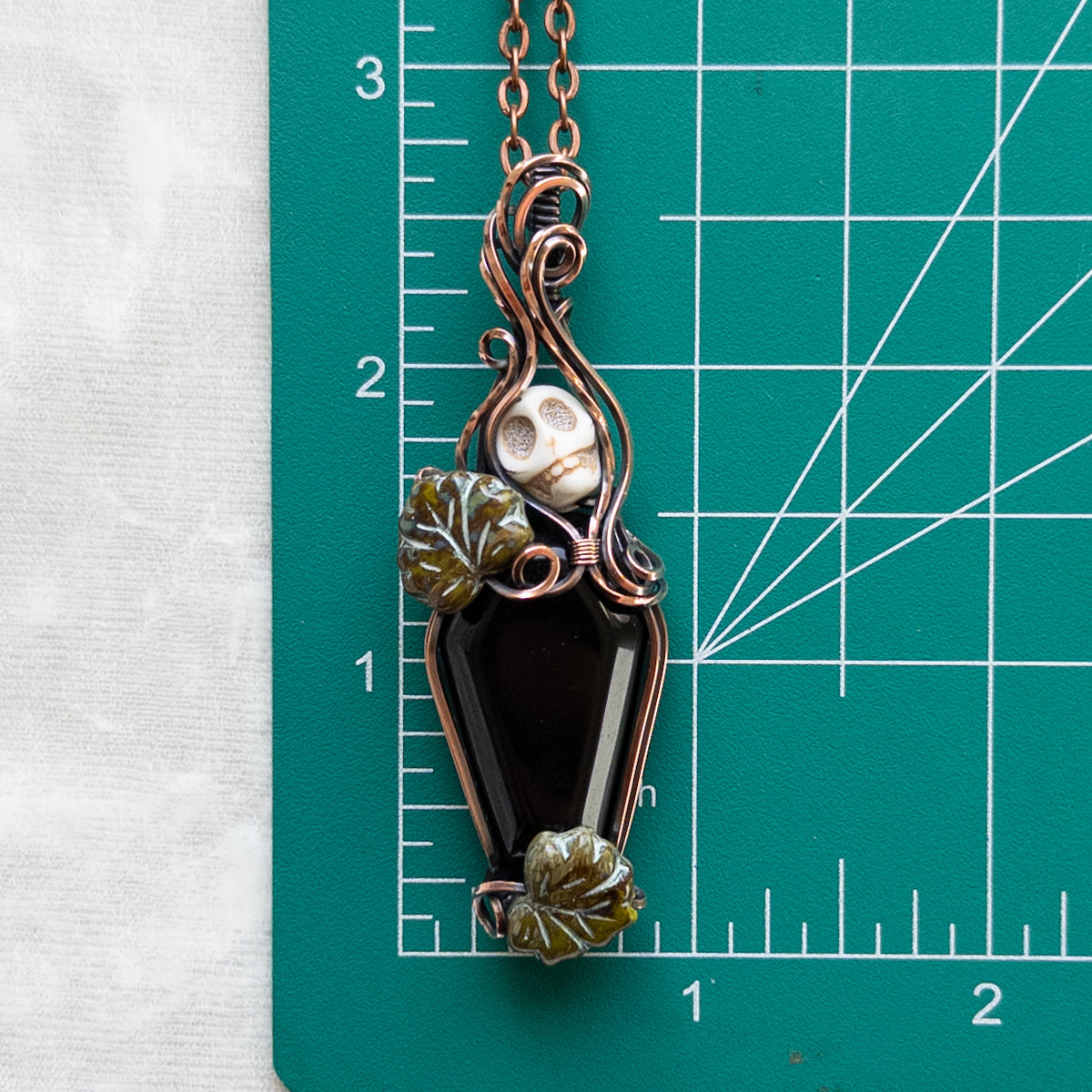 Obsidian Coffin & Skull Antiqued Copper Pendant With Czech Glass Leaves