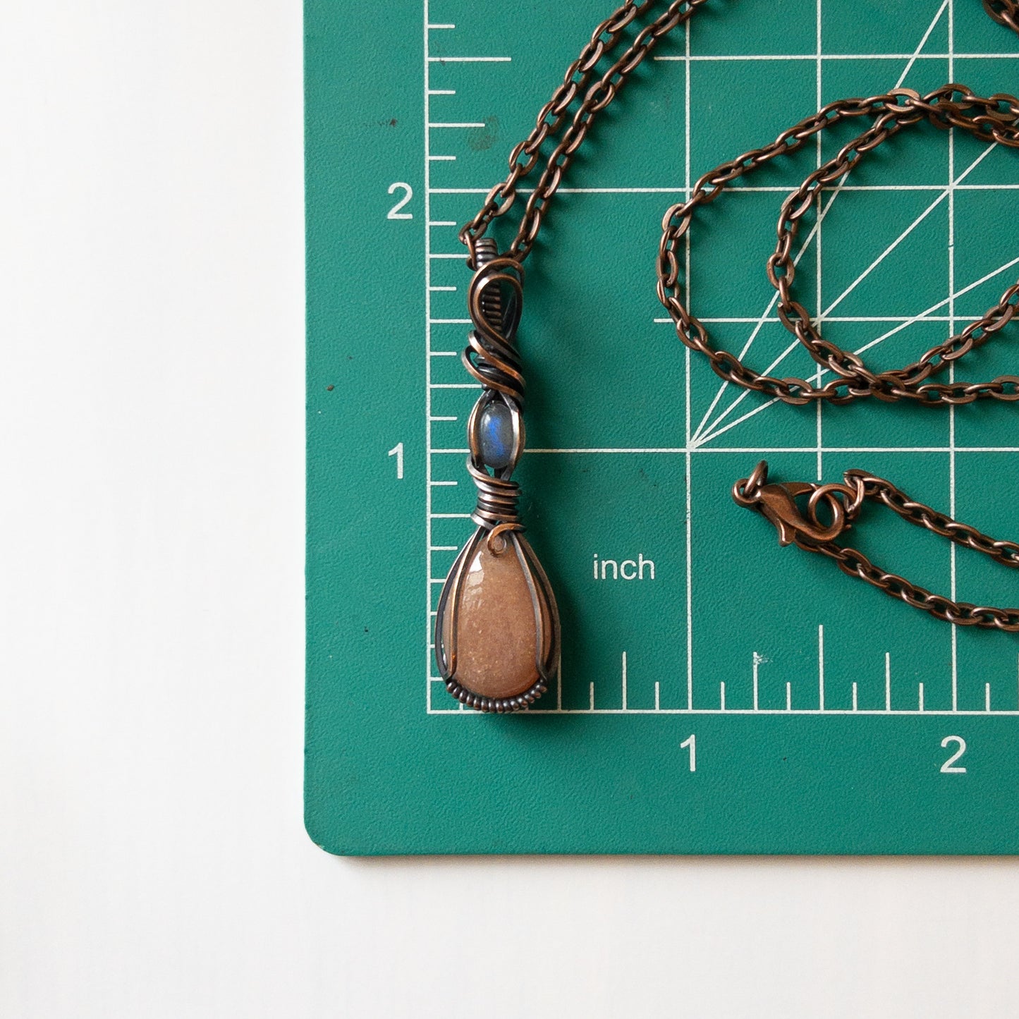 Sunstone With Labradorite & Copper Wrapped Pendant