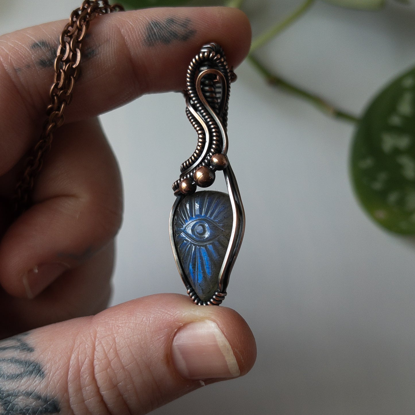 Labradorite With Carved Eye Motif & Copper Wrapped Pendant