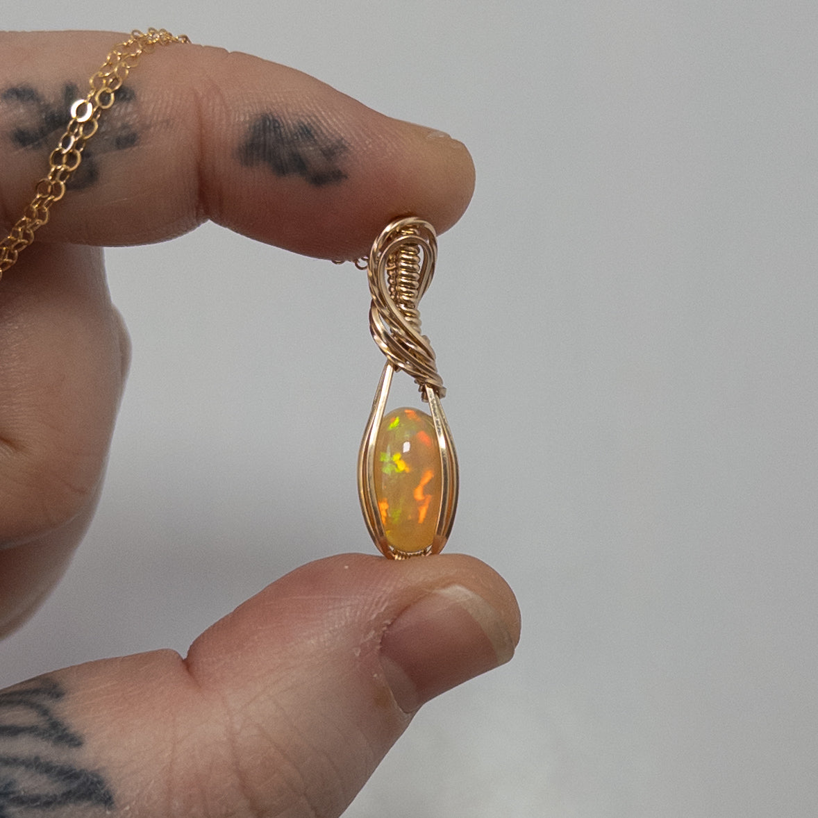 2.25 Carat Peachy Ethiopian Opal 14k Gold Filled Wrapped Pendant