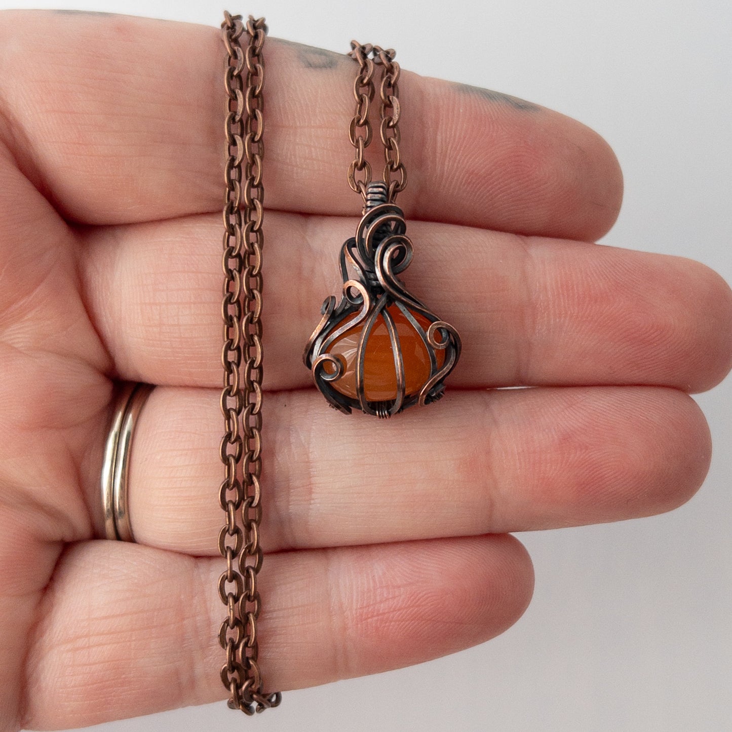 Dainty Carnelian Pumpkin Antiqued Copper Wrapped Pendant