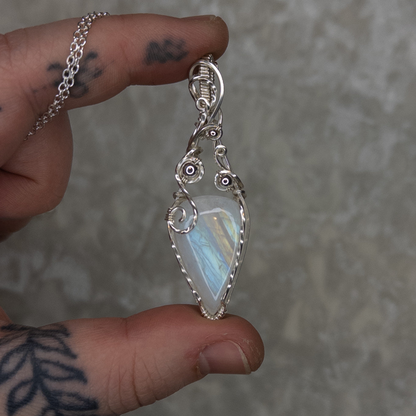 “Bubbles” Rainbow Moonstone & Sterling Silver Wrapped Pendant