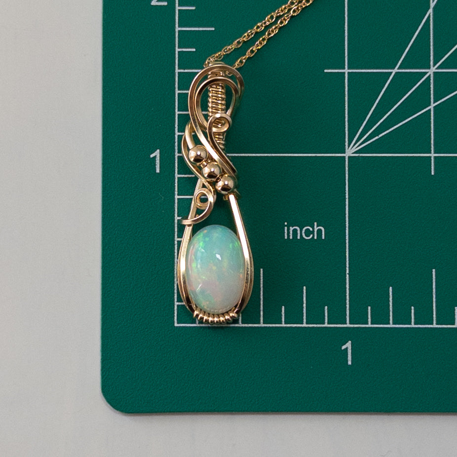 4 Carat Ethiopian Opal 14k Gold Filled Wrapped Pendant