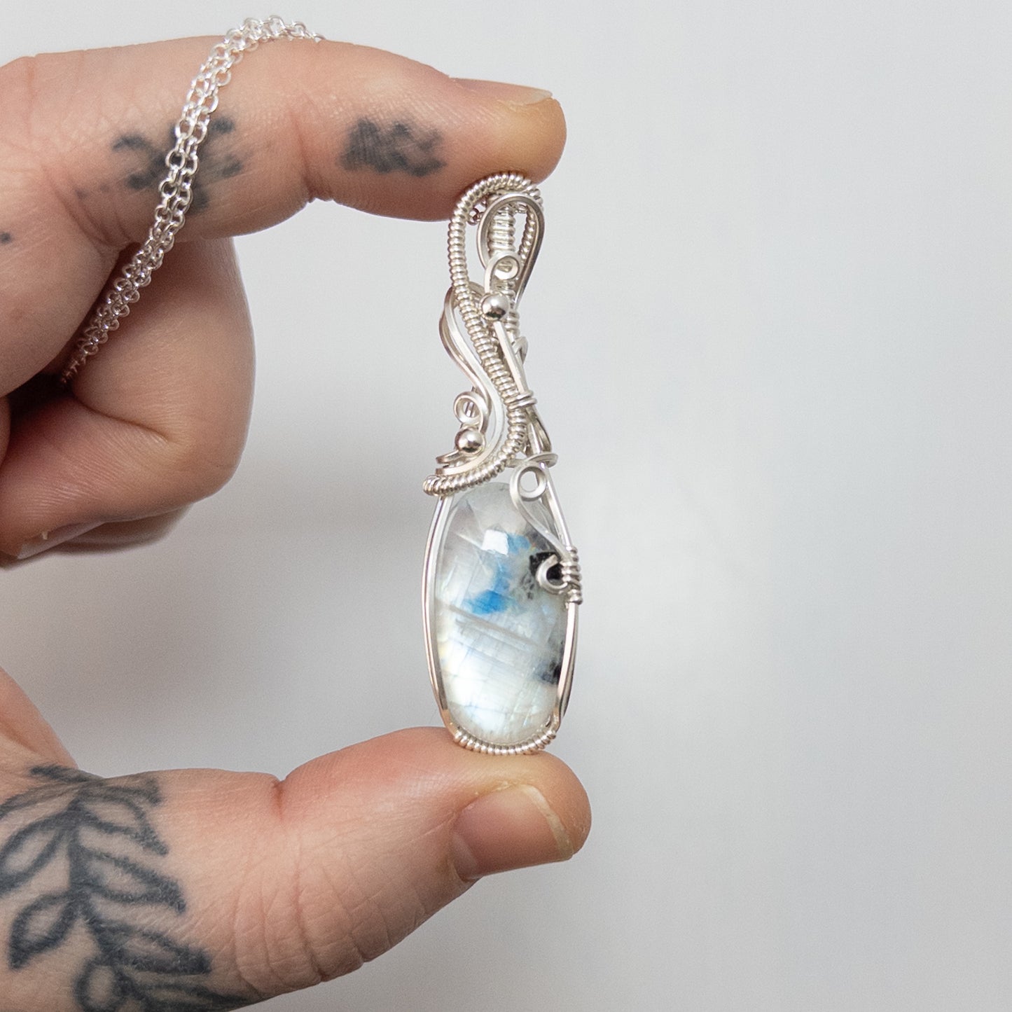 Rainbow Moonstone Sterling Silver Wrapped Pendant