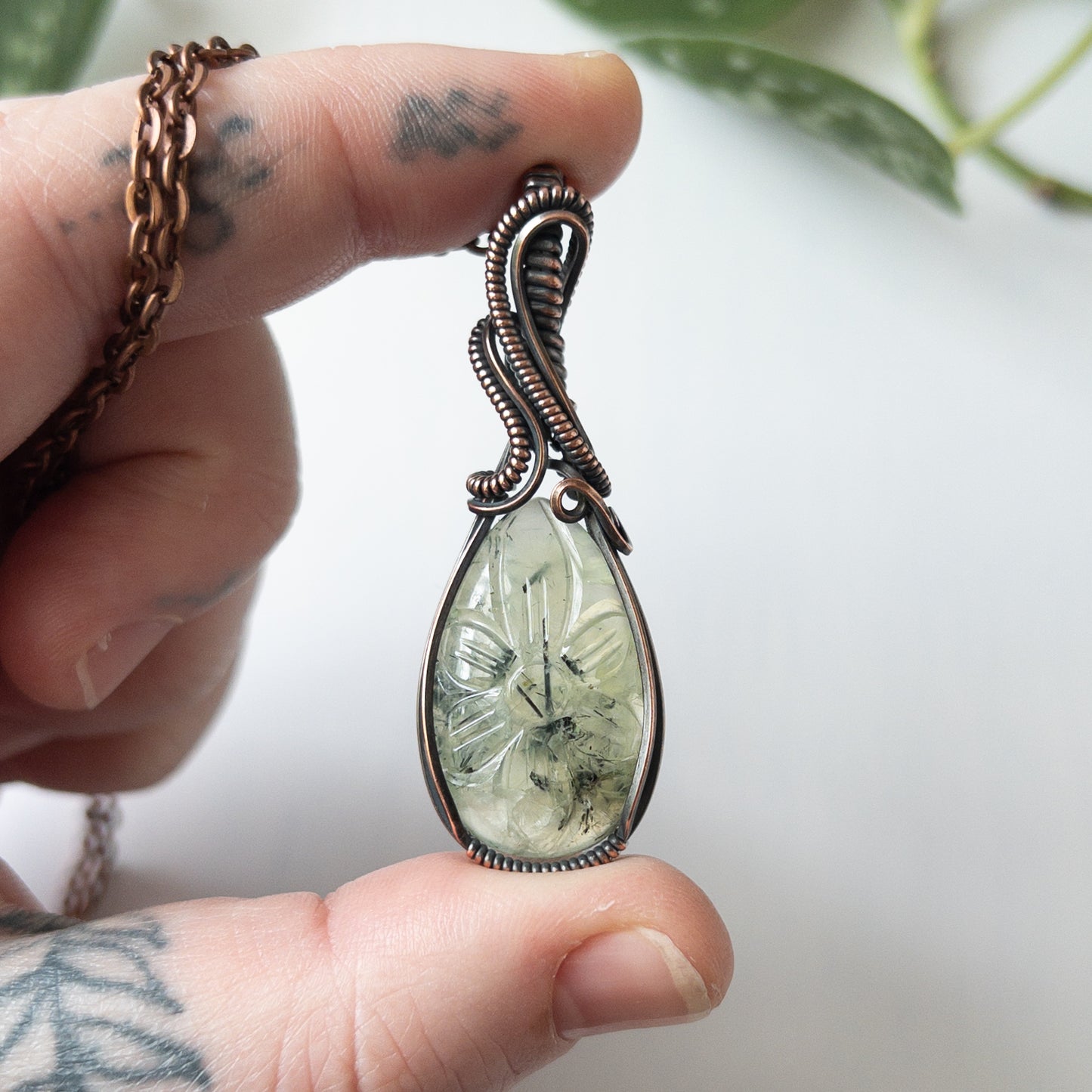 Prehnite With Carved Flower Motif & Copper Wrapped Pendant