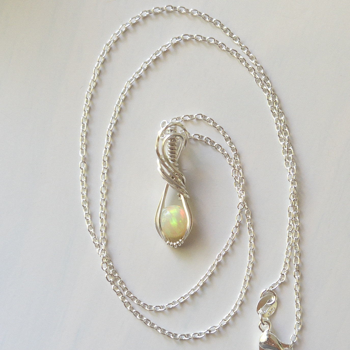 Ethiopian Opal & Sterling Silver Wrapped Pendant
