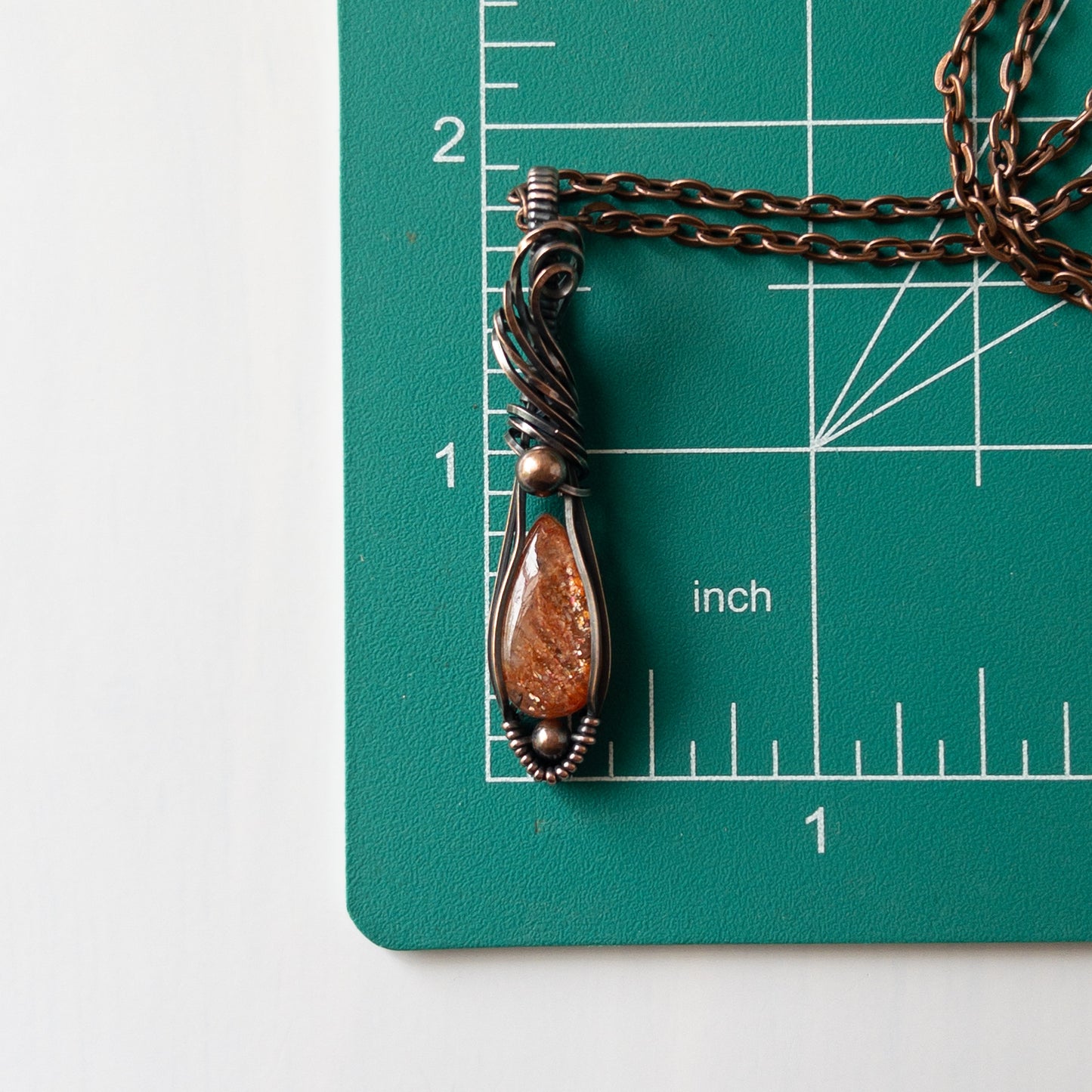 Dainty Sunstone & Copper Wrapped Pendant