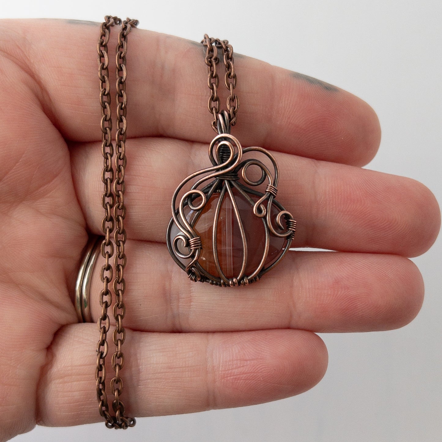 Banded Carnelian Pumpkin Antiqued Copper Wrapped Pendant
