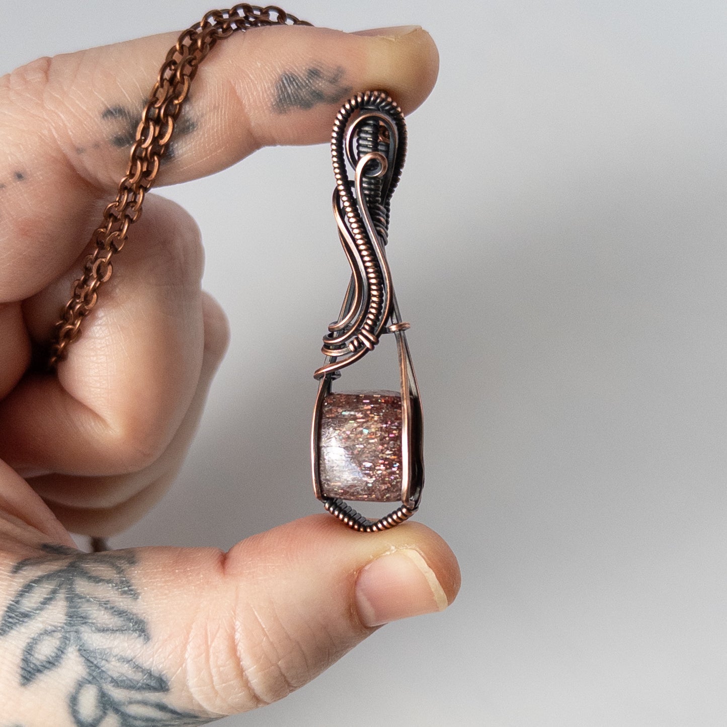 Bloodshot Iolite Sunstone Antiqued Copper Wrapped Pendant