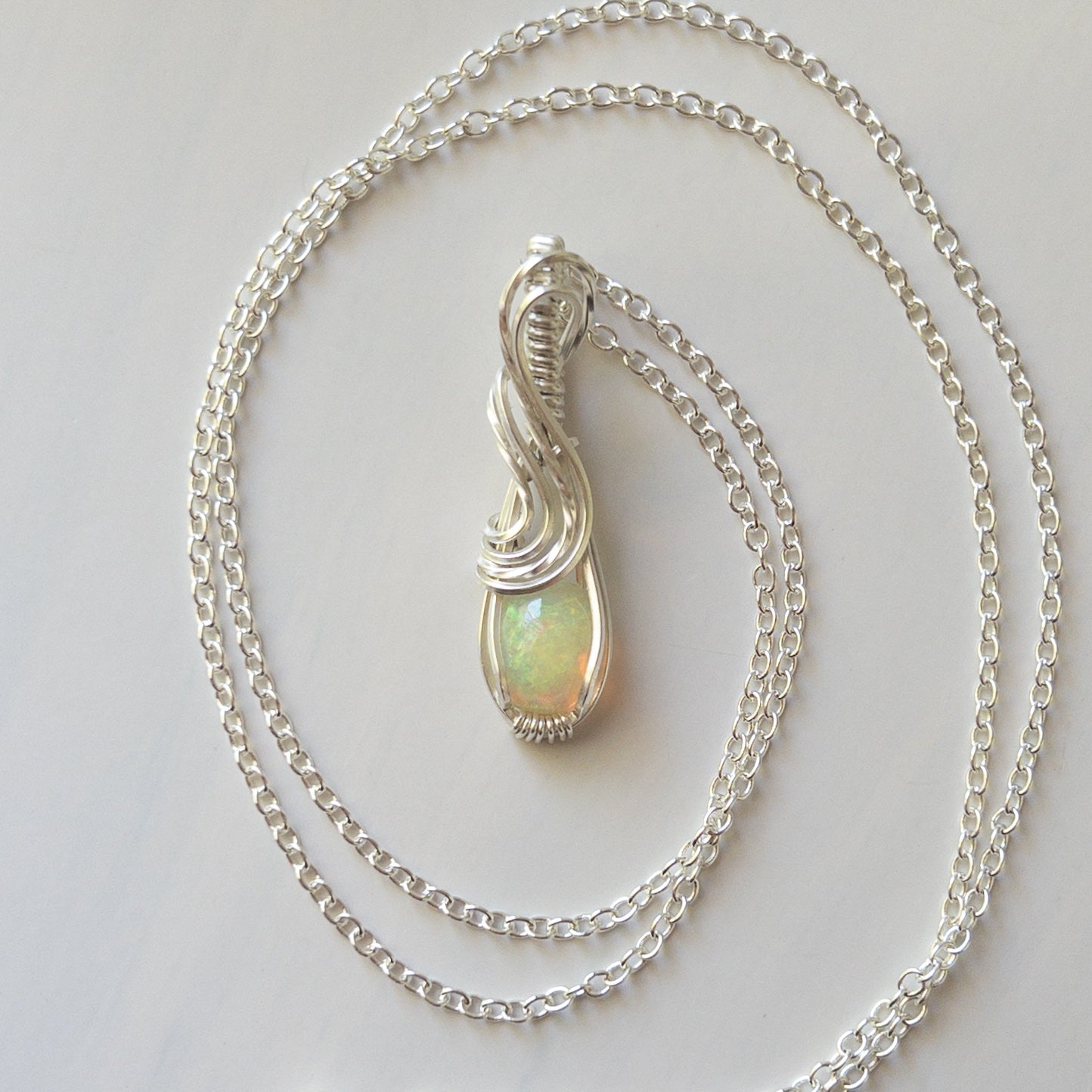Seirios - Ethiopian Opal Sterling Silver Wrapped Pendant