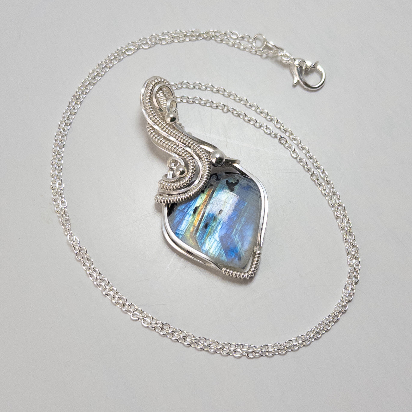 High Quality Rainbow Moonstone Sterling Silver Wrapped Pendant
