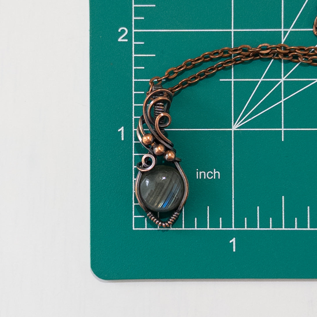 Diagonalis- Labradorite Wrapped Copper Pendant