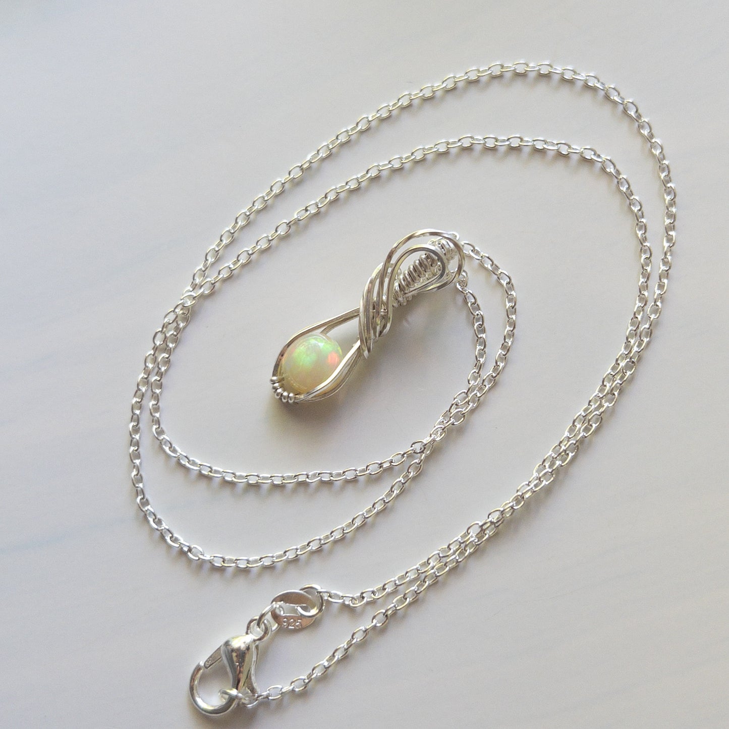 Ethiopian Opal & Sterling Silver Wrapped Pendant