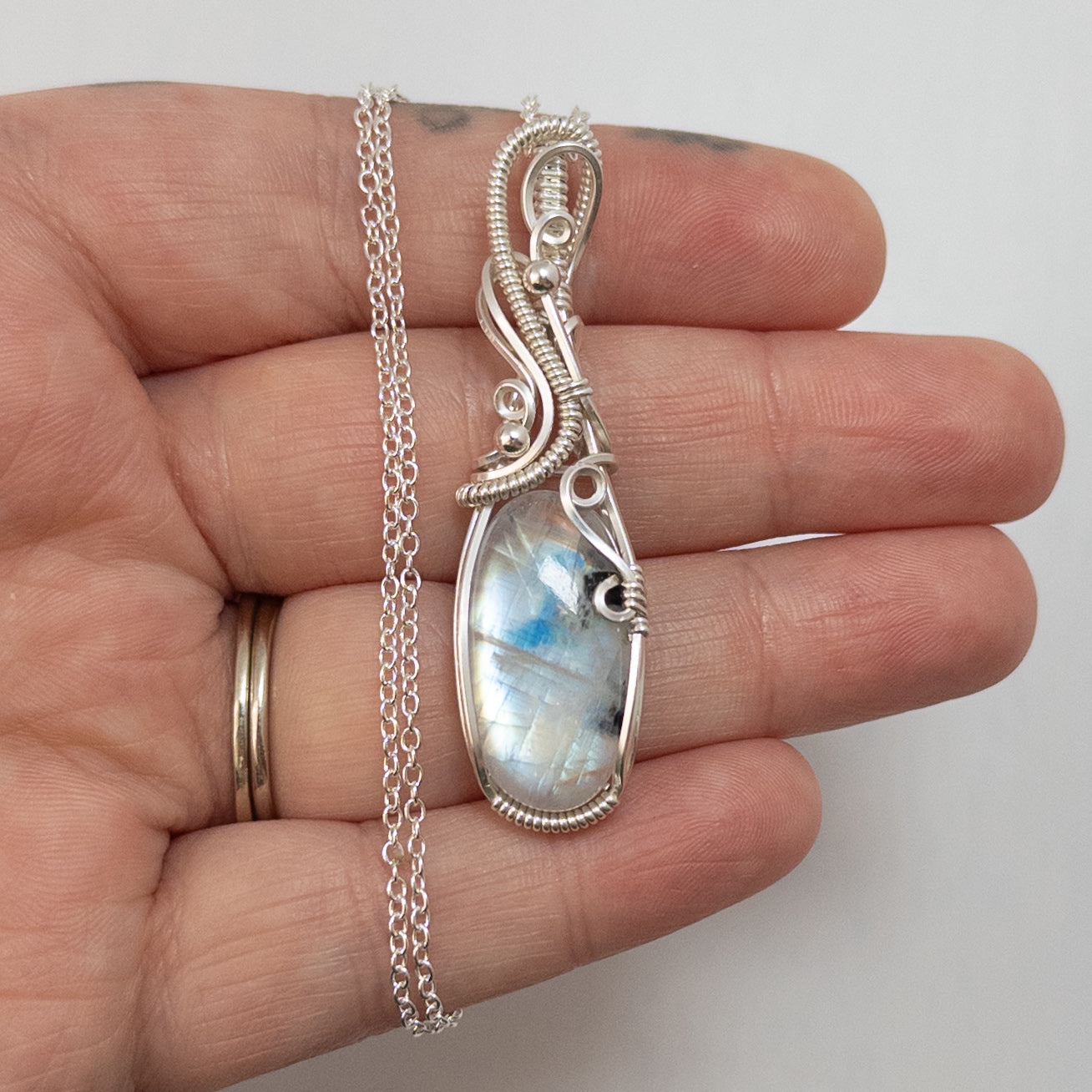 Rainbow Moonstone Sterling Silver Wrapped Pendant