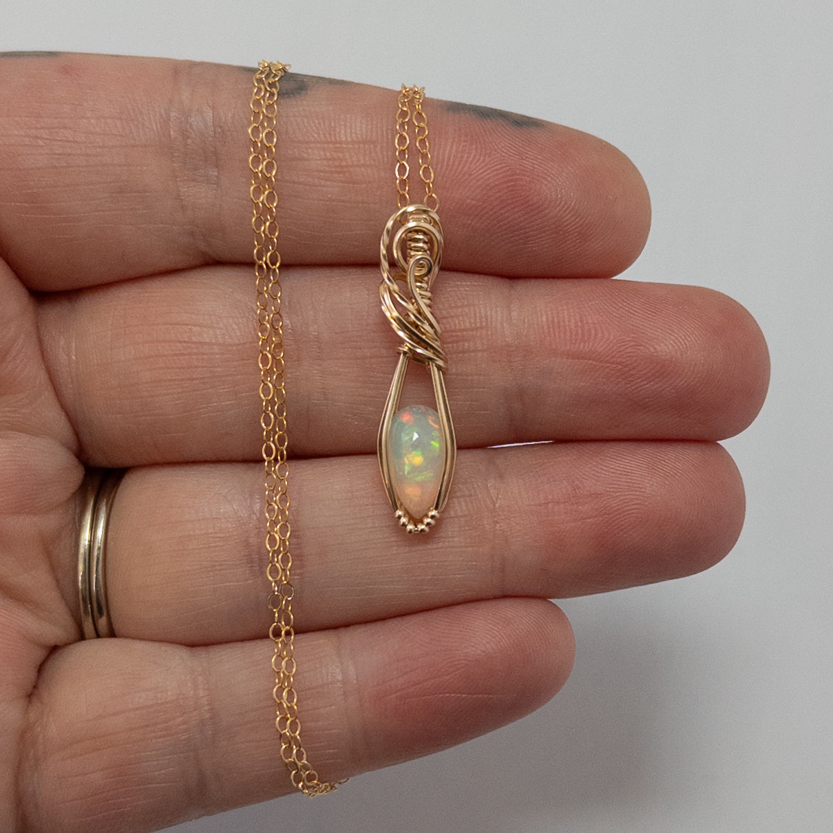 1 Carat Ethiopian Opal 14k Gold Filled Wrapped Pendant