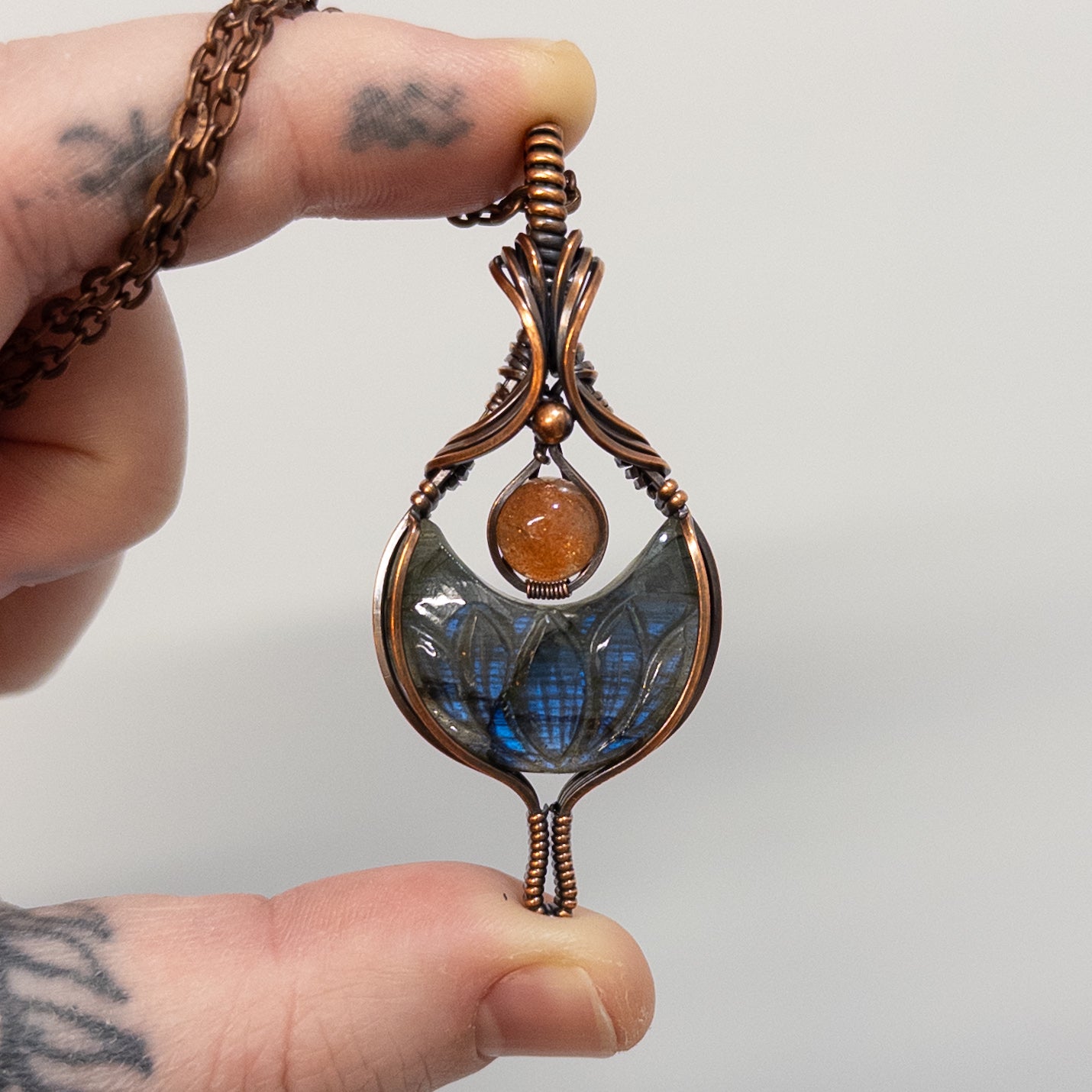 Euphoria - Lotus Carved Labradorite Crescent Moon & Sunstone Copper Pendant
