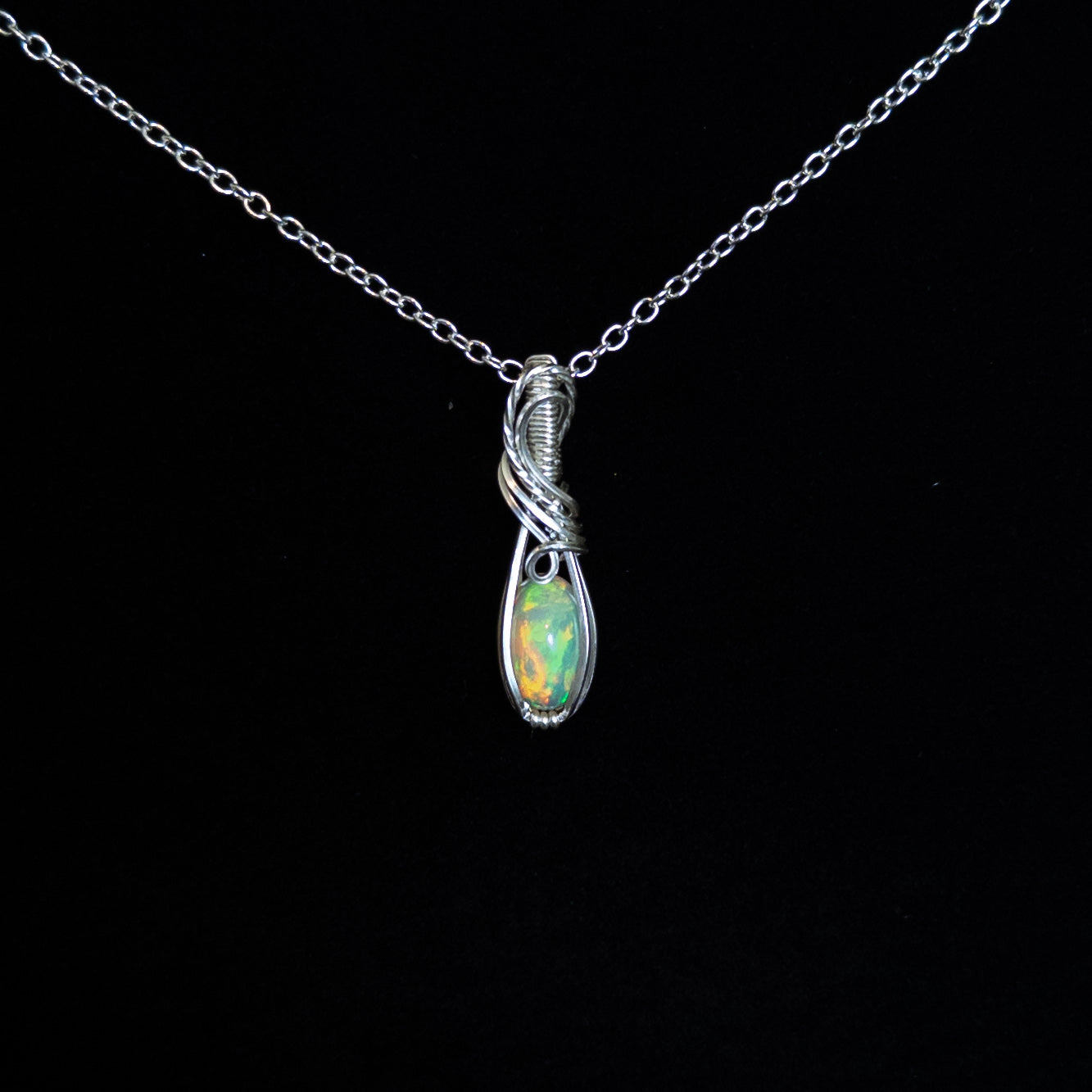 1.5 Carat Ethiopian Opal Sterling Silver Wrapped Pendant