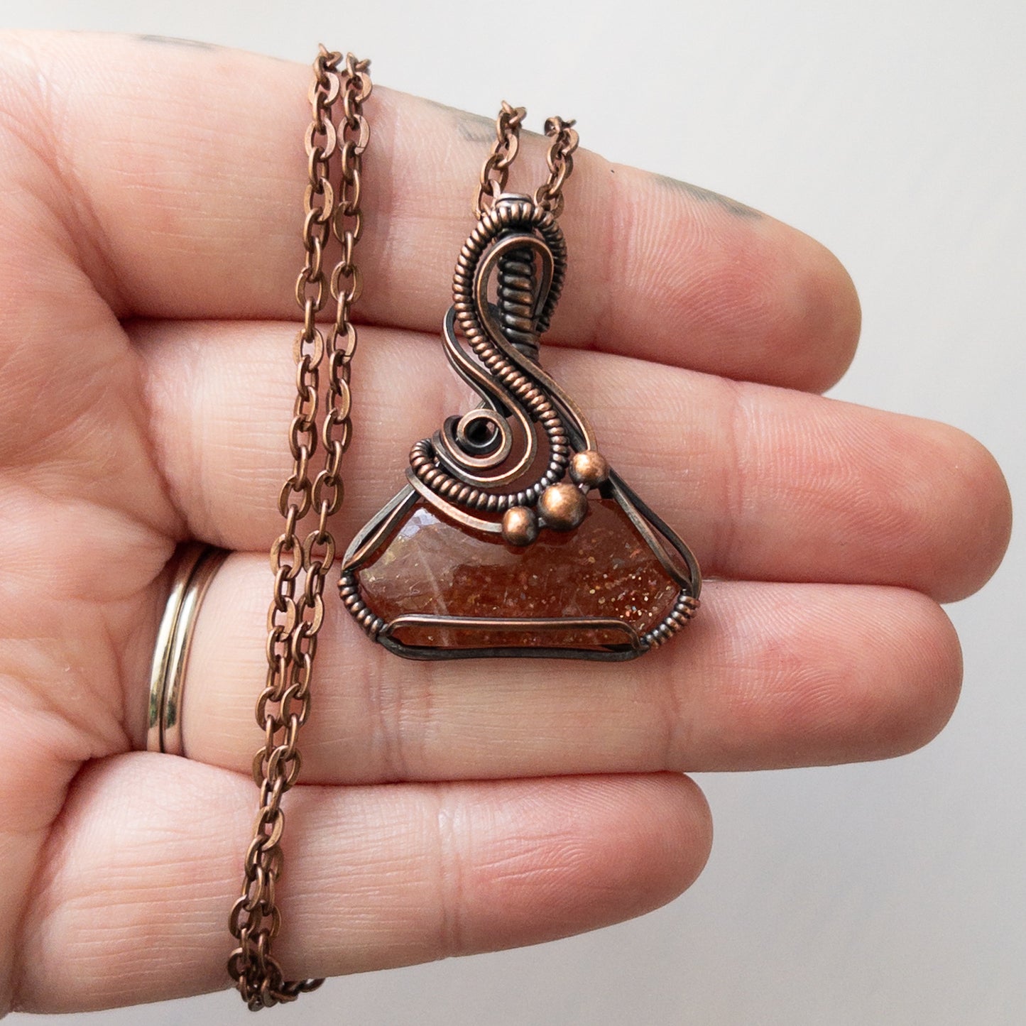 Sunstone “Potion Bottle” Shaped Copper Wrapped Pendant