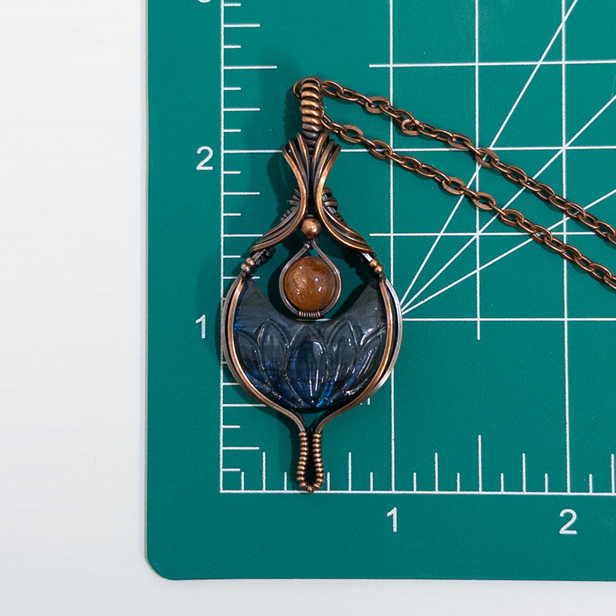 Euphoria - Lotus Carved Labradorite Crescent Moon & Sunstone Copper Pendant